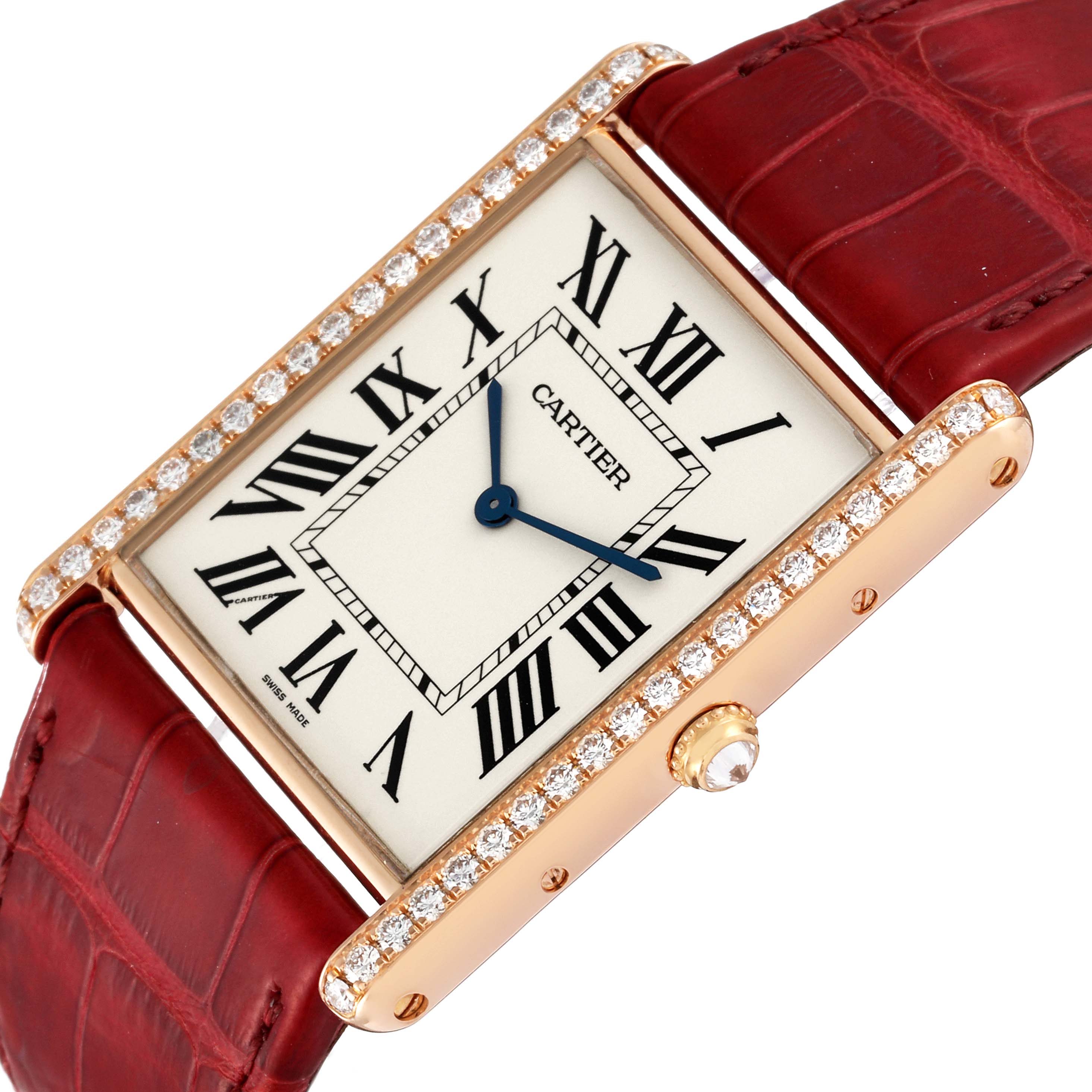 The image shows a close-up oblique angle of the Tank Louis watch by Cartier, highlighting the face, bezel, and part of the strap.