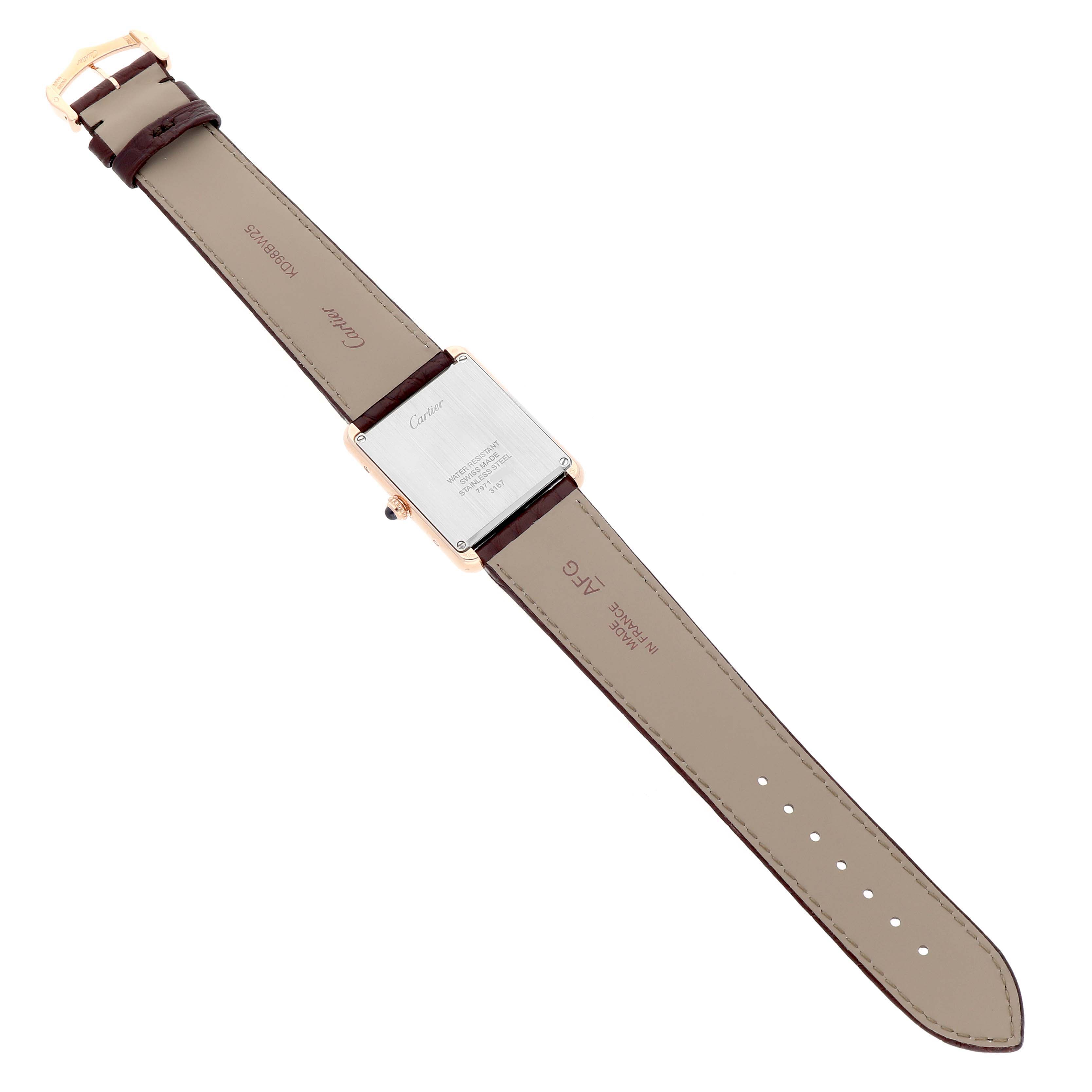 The Cartier Tank Solo W5200025 Men's Steel and Gold (two tone) Silver Dial watch is shown from the back, displaying the case back and entire strap.