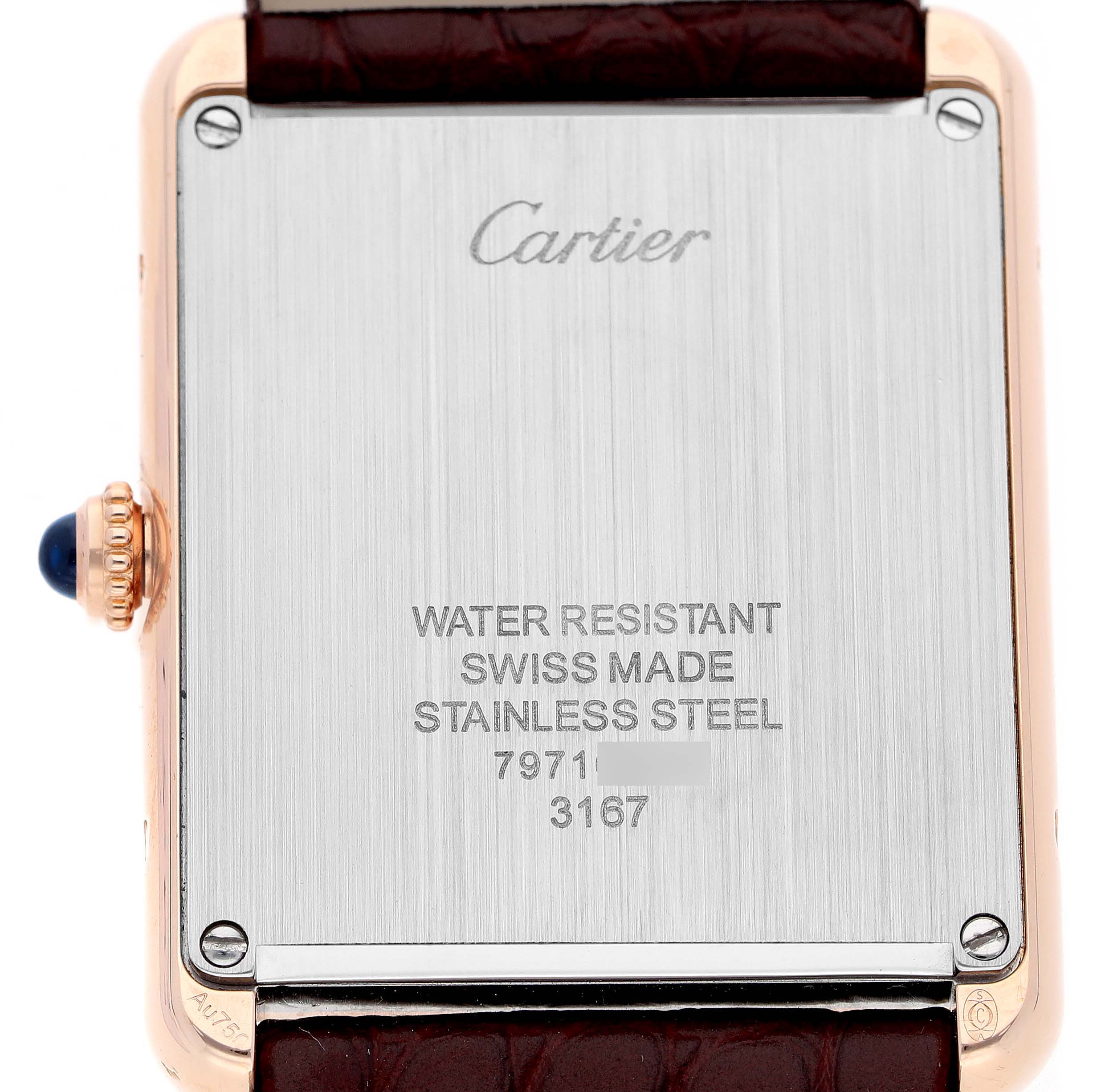 The image shows the back case of a Cartier Tank Solo W5200025 Men's Steel and Gold (two tone) Silver Dial watch, highlighting its water resistance, Swiss origin, and stainless steel material.