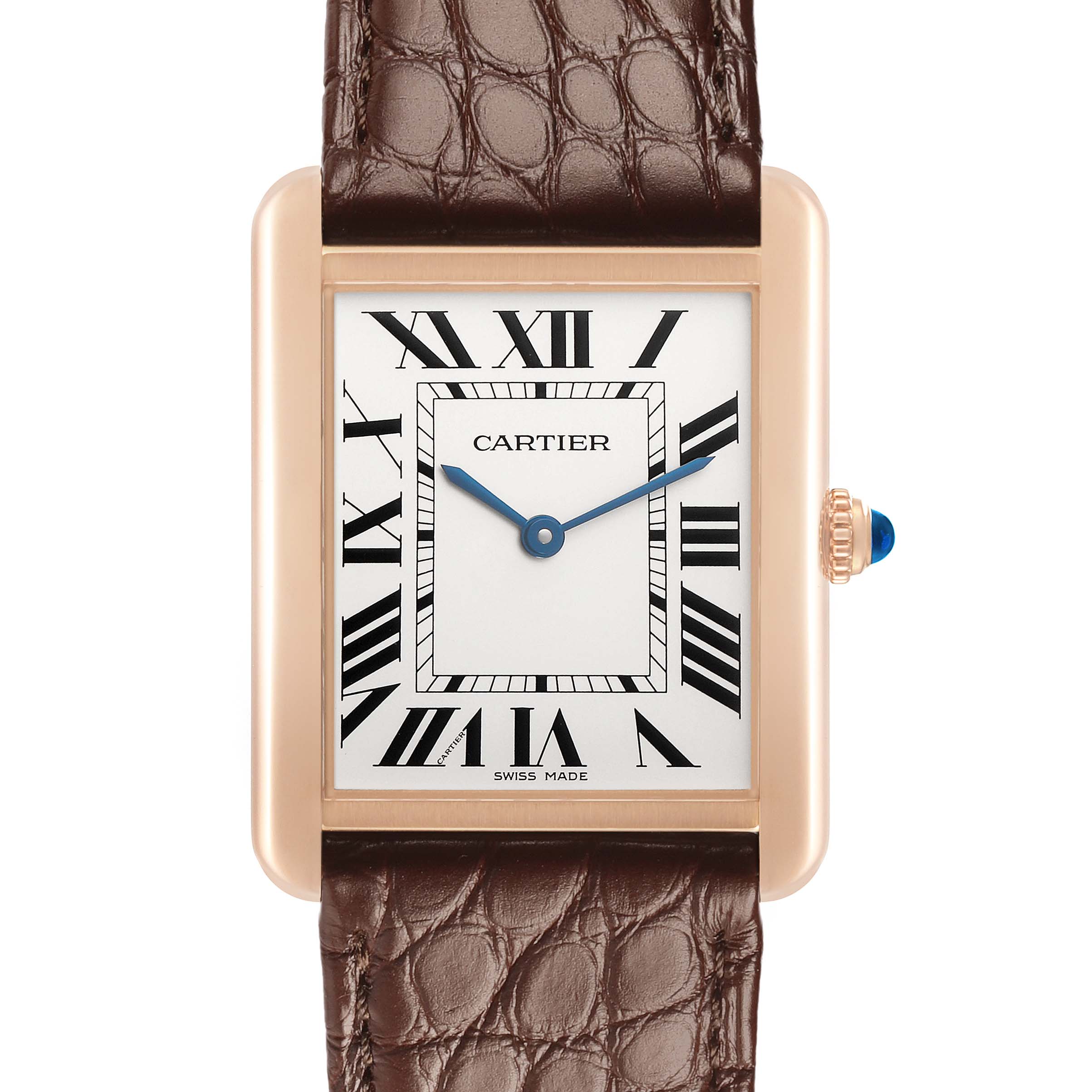 The Cartier Tank Solo W5200025 Men's Steel and Gold (two tone) Silver Dial watch is shown from a front angle, highlighting its rectangular face, Roman numerals, and brown leather strap.