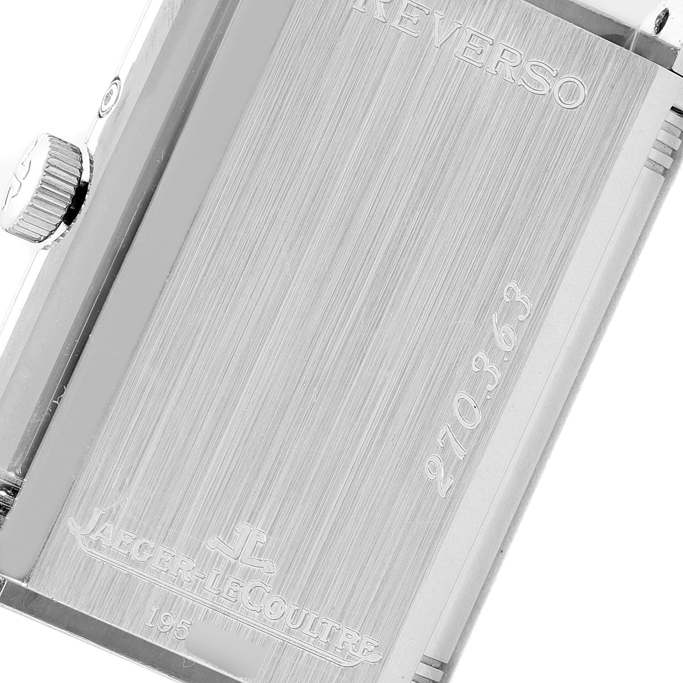 The image shows a close-up of the back of a Jaeger LeCoultre Reverso Q2753470 Men's White Gold Black Dial Q2753470 Men's White Gold Black Dial watch, displaying its brushed metal finish and engraved details.