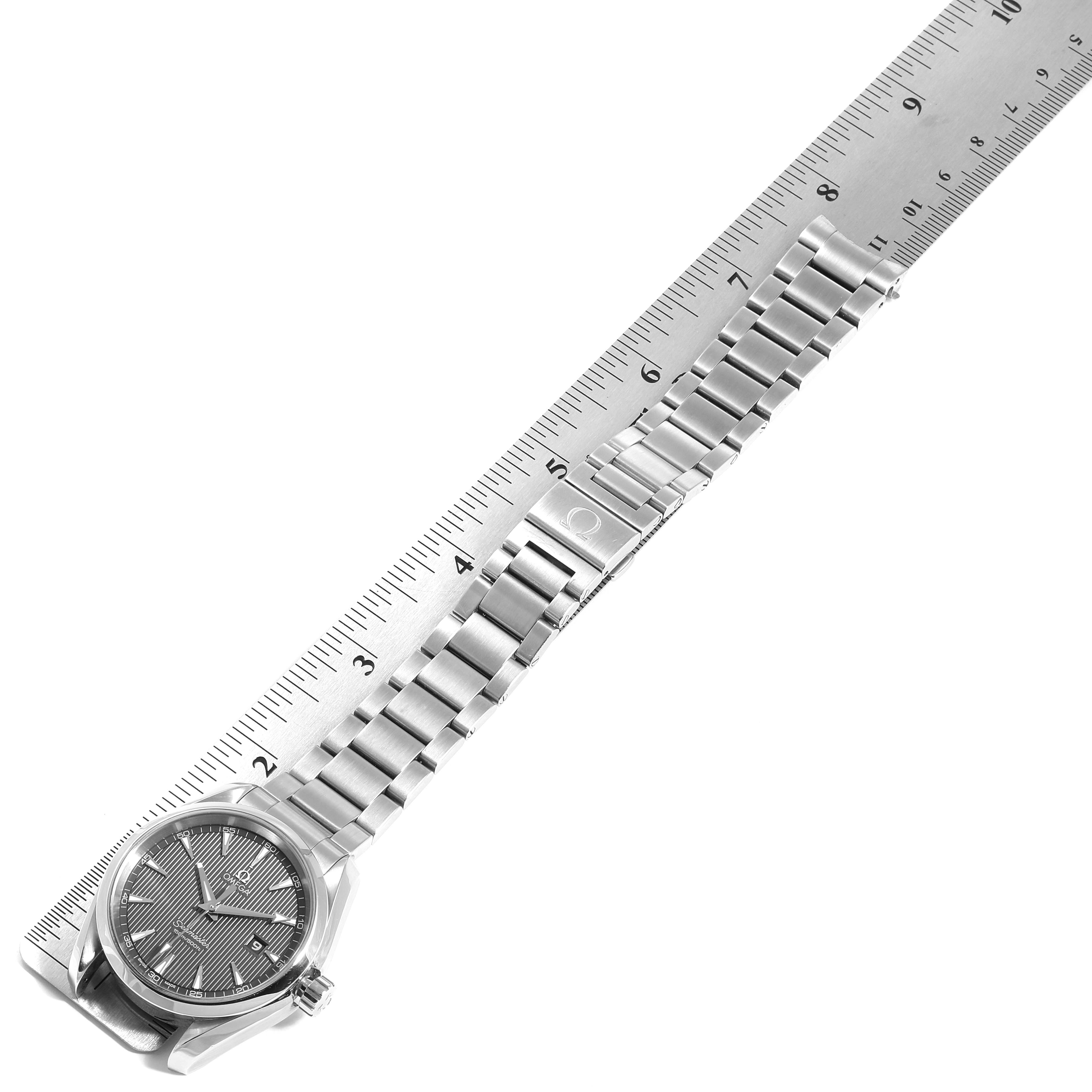 The image shows an Omega Seamaster 231.10.39.60.06.001 Men
s Stainless Steel Grey Dial 231.10.39.60.06.001 Men
s Stainless Steel Grey Dial watch laid flat alongside a ruler, displaying the face and full metal bracelet.