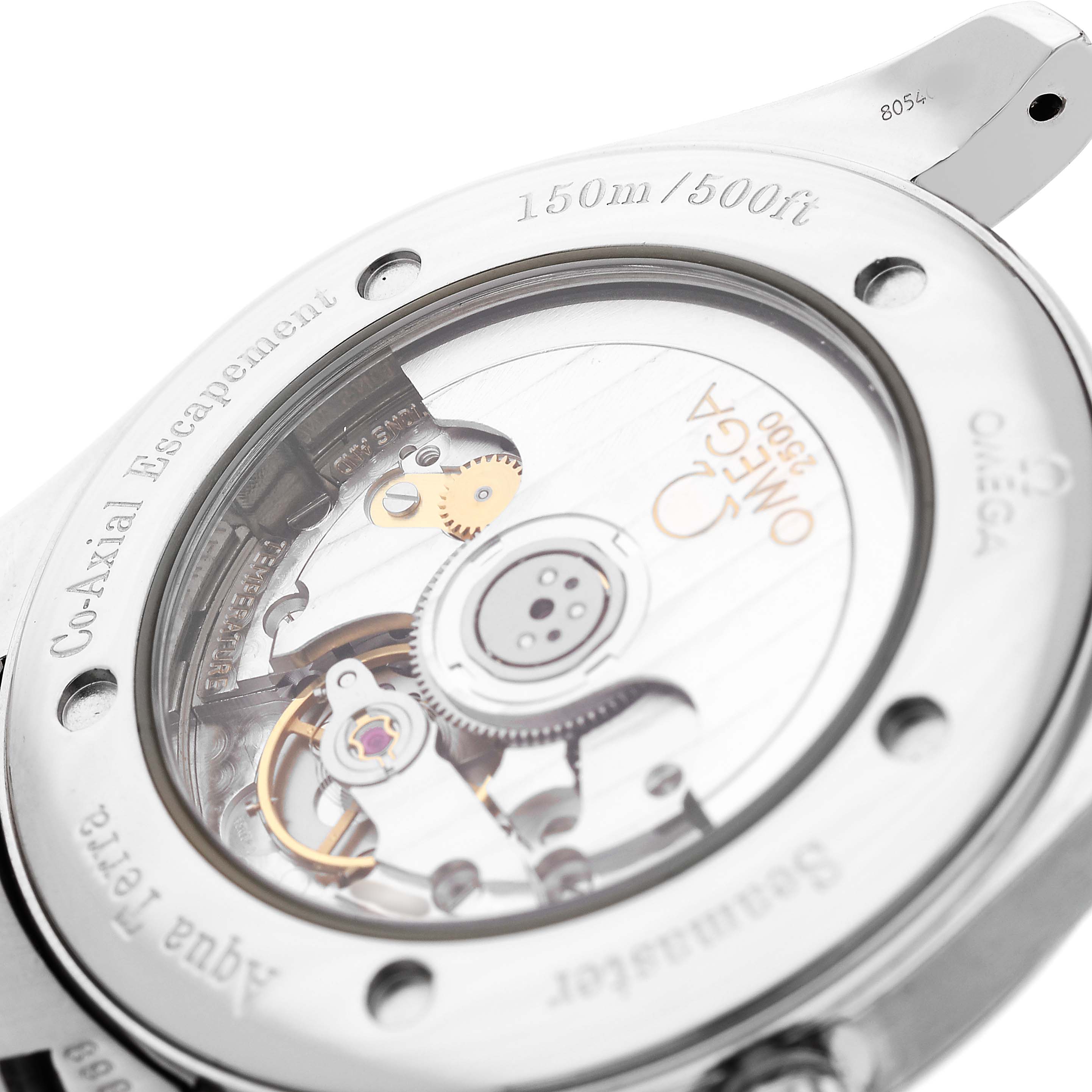 The image shows the back of an Omega Seamaster 2503.34.00 Men's Stainless Steel White Dial watch, highlighting its transparent case back and inner mechanical movement.