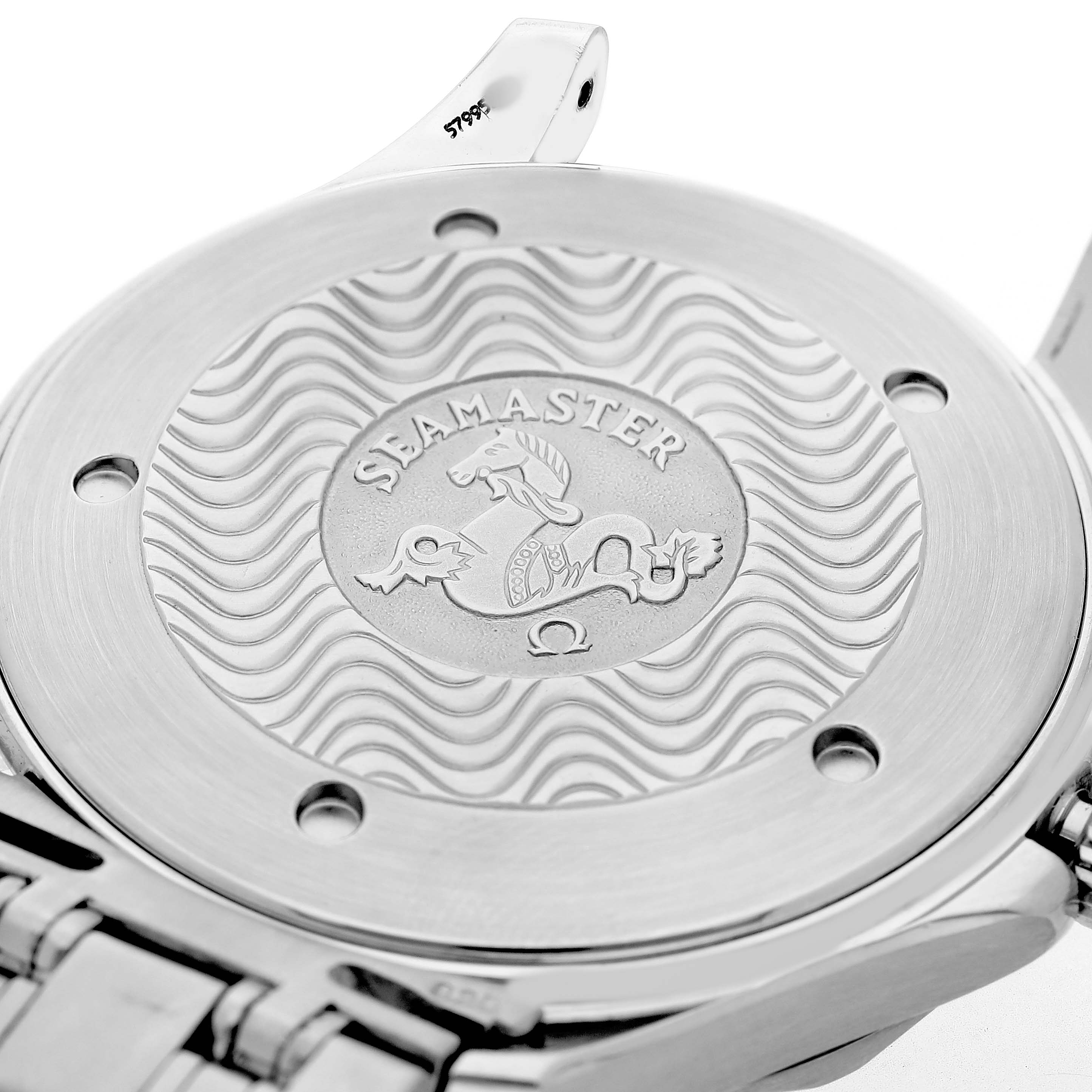 The image shows the back of an Omega Seamaster 2541.80.00 Men's Stainless Steel Blue Dial watch, highlighting its engraved design and bracelet connection.