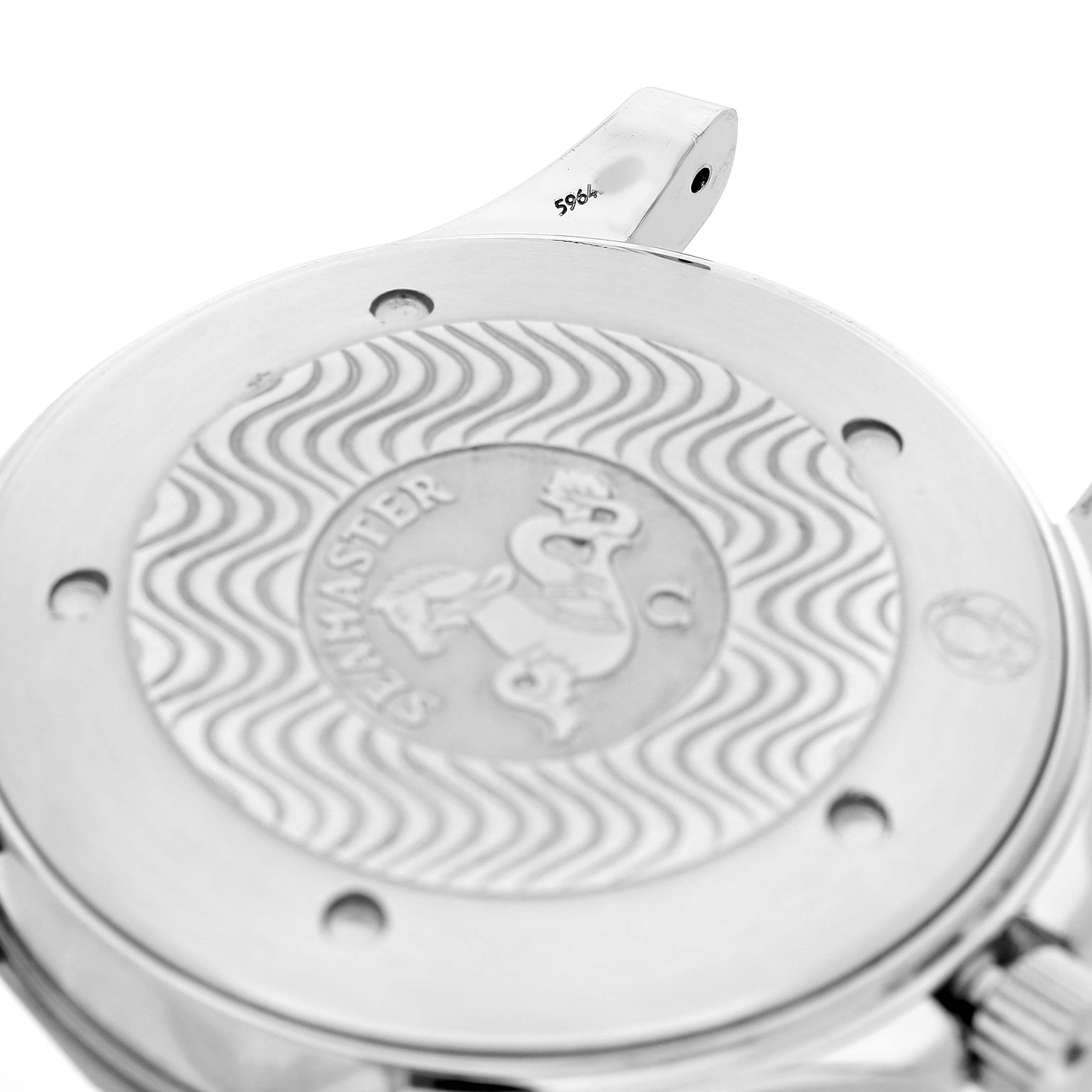 The image shows the back case of the Omega Seamaster 2541.80.00 Men's Stainless Steel Blue Dial, featuring a wavy pattern and engraved emblem.