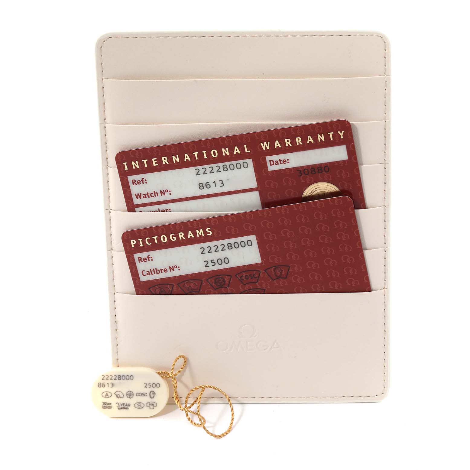 The image shows the warranty cards and tags for the Omega Seamaster 2222.80.00 Men's Stainless Steel Blue Dial 2222.80.00 Men's Stainless Steel Blue Dial watch, placed in a branded card holder.