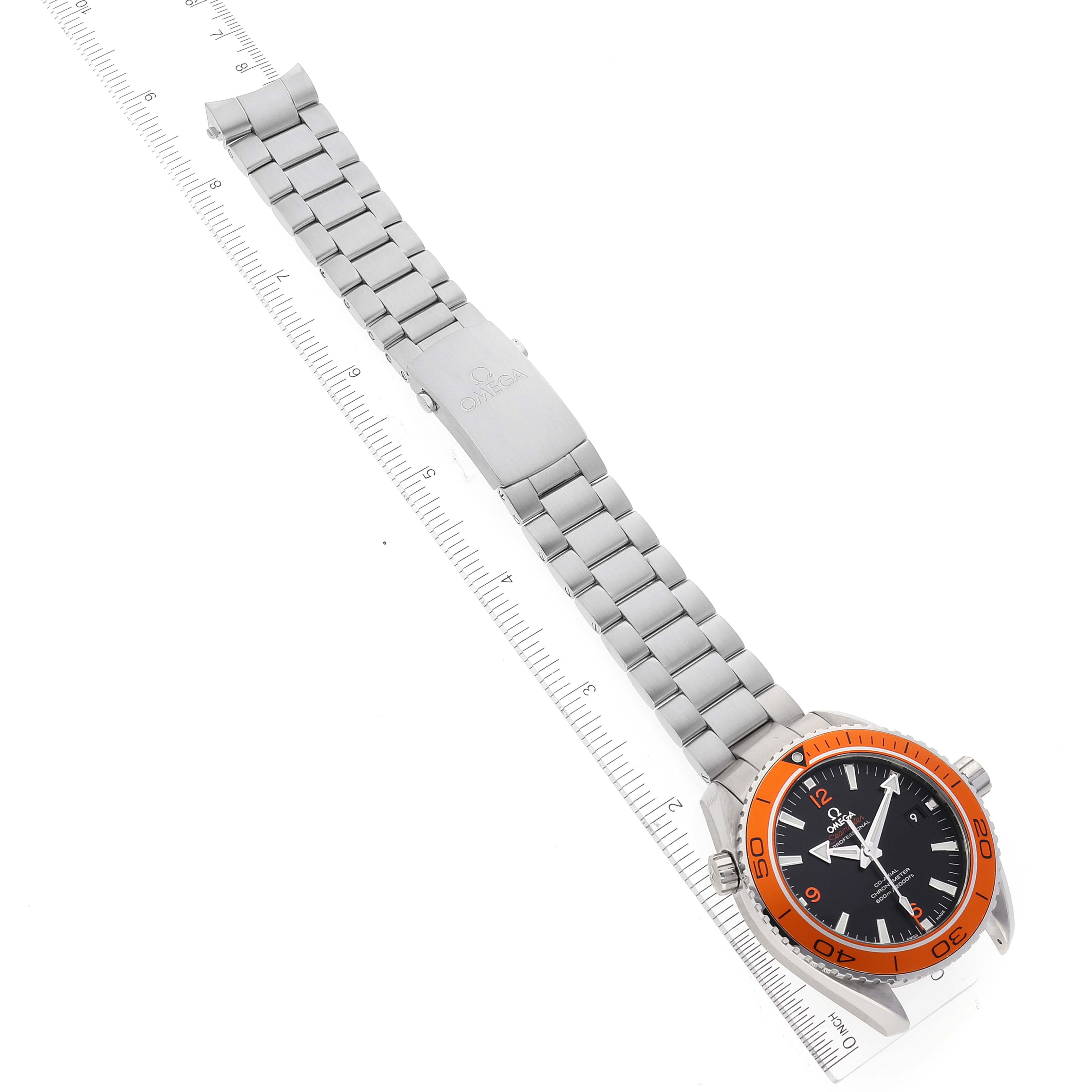 The image shows an Omega Planet Ocean 232.30.46.21.01.002 Men's Stainless Steel Black Dial 232.30.46.21.01.002 Men's Stainless Steel Black Dial watch laid flat, photographed from an overhead angle, including the full bracelet and face.