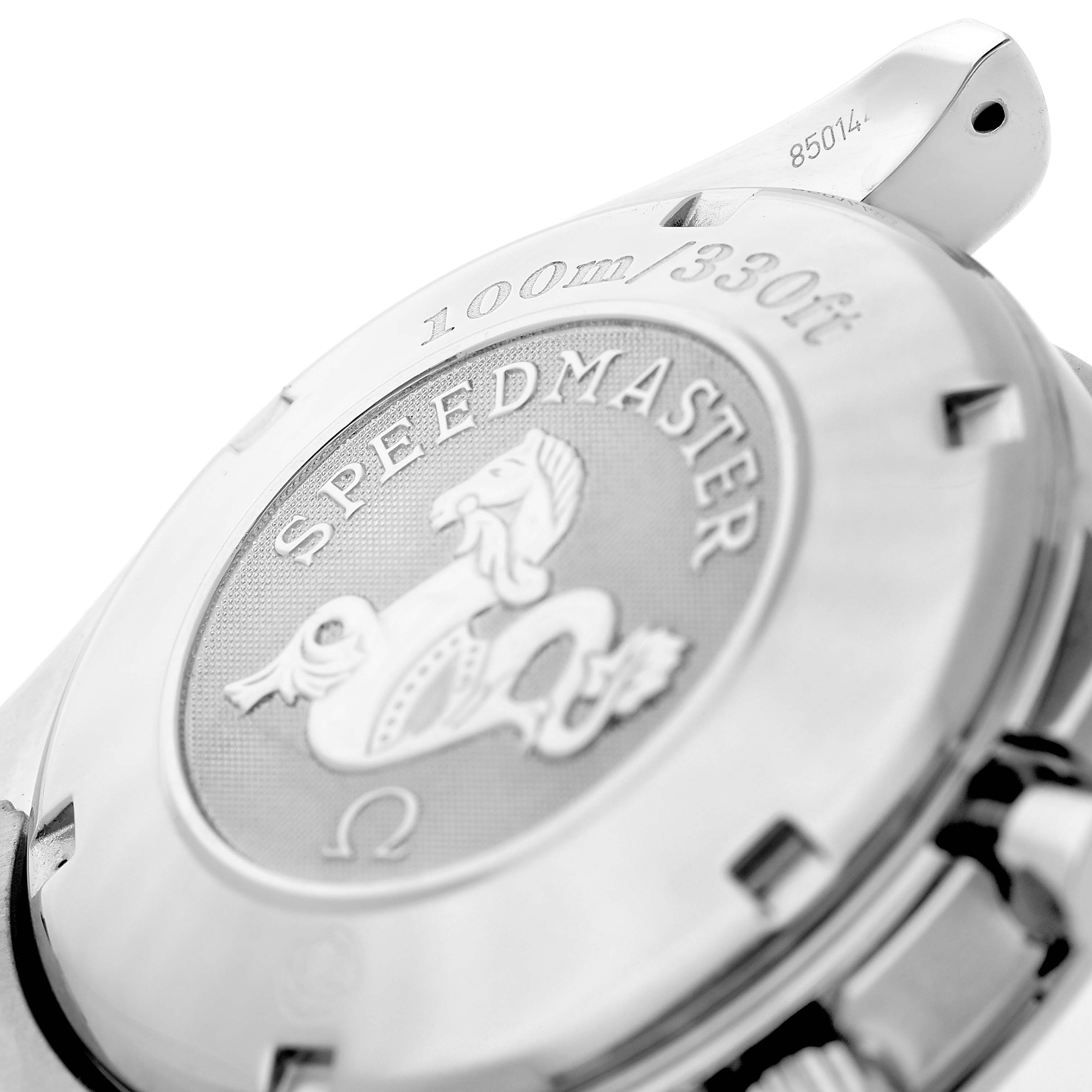 The image shows the back case of the Omega Speedmaster 3210.50.00 Men's Stainless Steel Black Dial, highlighting the engraved logo and water resistance details.