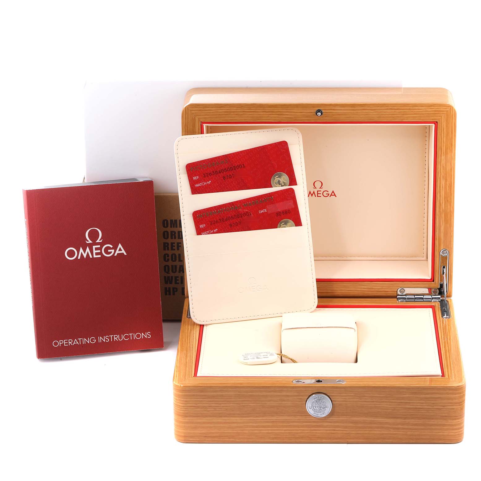 The image shows the packaging, warranty cards, and instruction manual for the Omega Speedmaster 326.30.40.50.02.001 Men's Stainless Steel Silver Dial 326.30.40.50.02.001 Men's Stainless Steel Silver Dial watch.