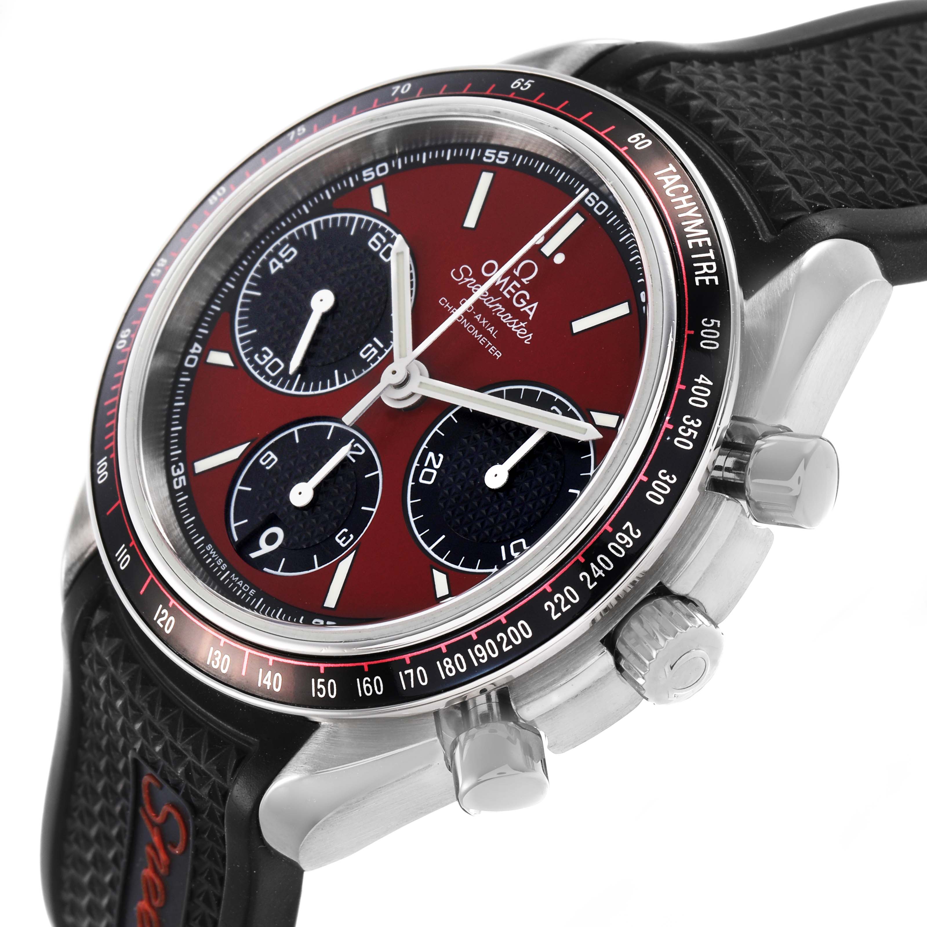 The Omega Speedmaster 326.32.40.50.11.001 Men's Stainless Steel Red Dial watch is shown at an angled side view, highlighting its red dial, chronograph sub-dials, and tachymeter bezel.