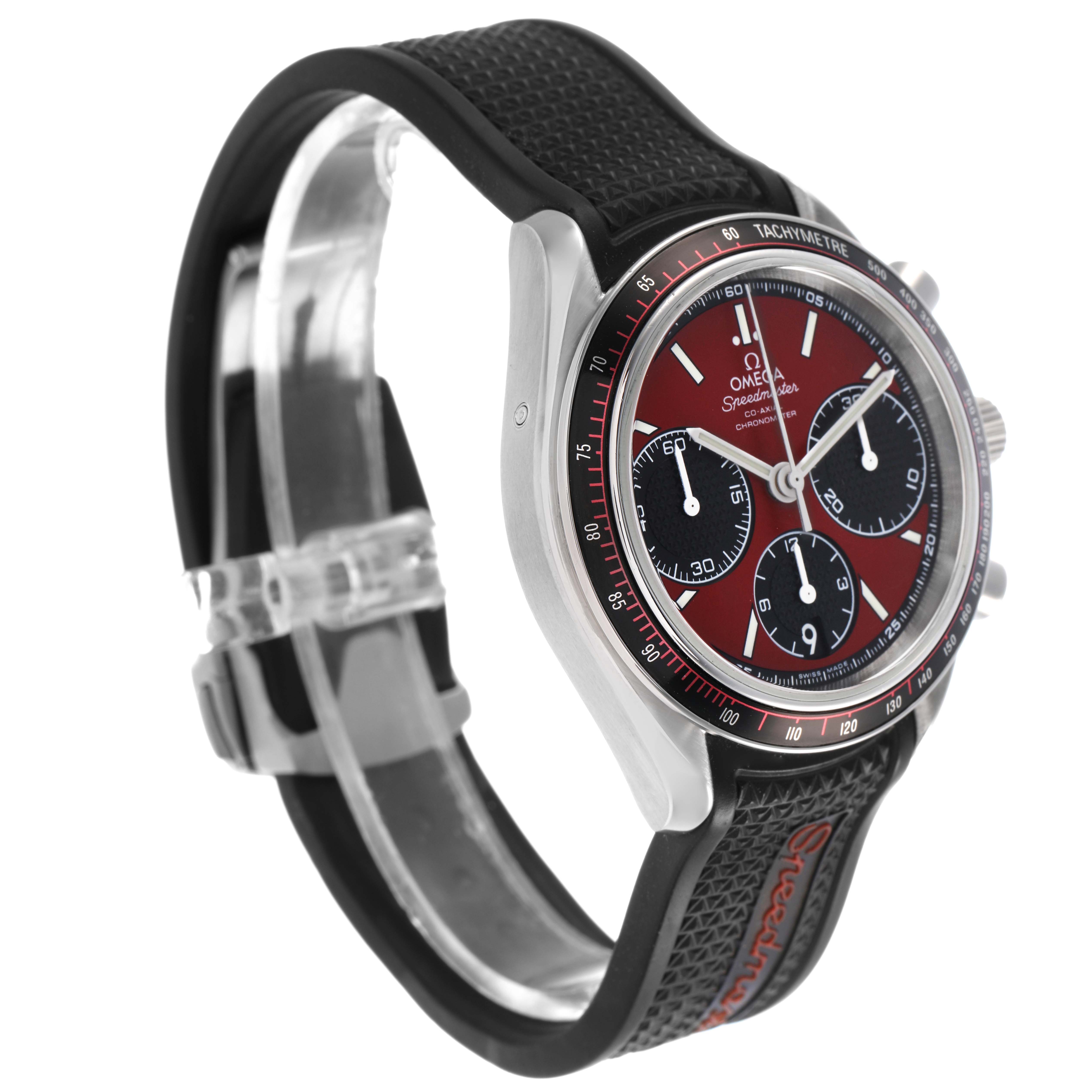 The Omega Speedmaster 326.32.40.50.11.001 Men's Stainless Steel Red Dial watch is shown at a slight side angle, highlighting the face, bezel, and band.