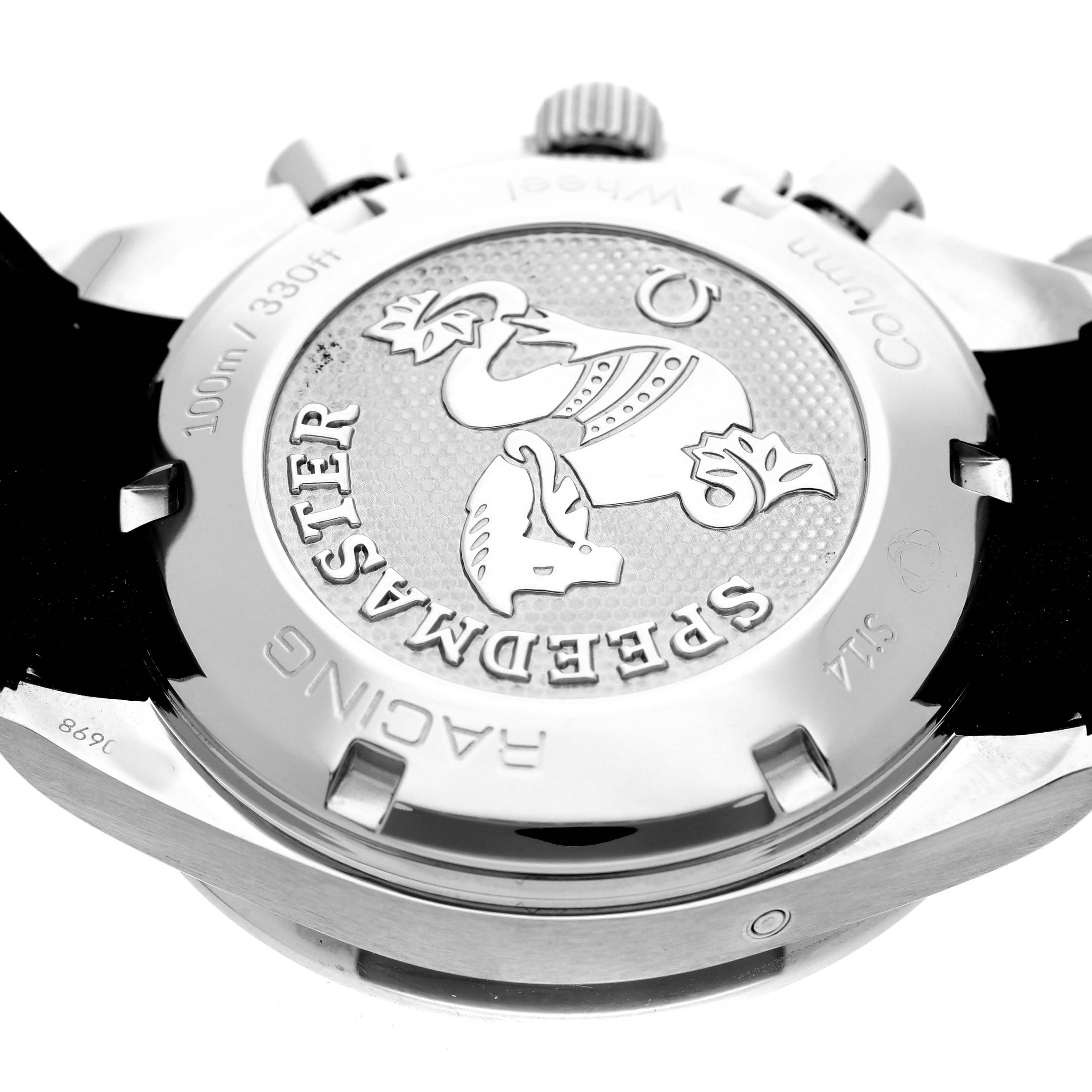 The image shows the back case of an Omega Speedmaster 326.32.40.50.11.001 Men's Stainless Steel Red Dial watch featuring engraved details and branding.
