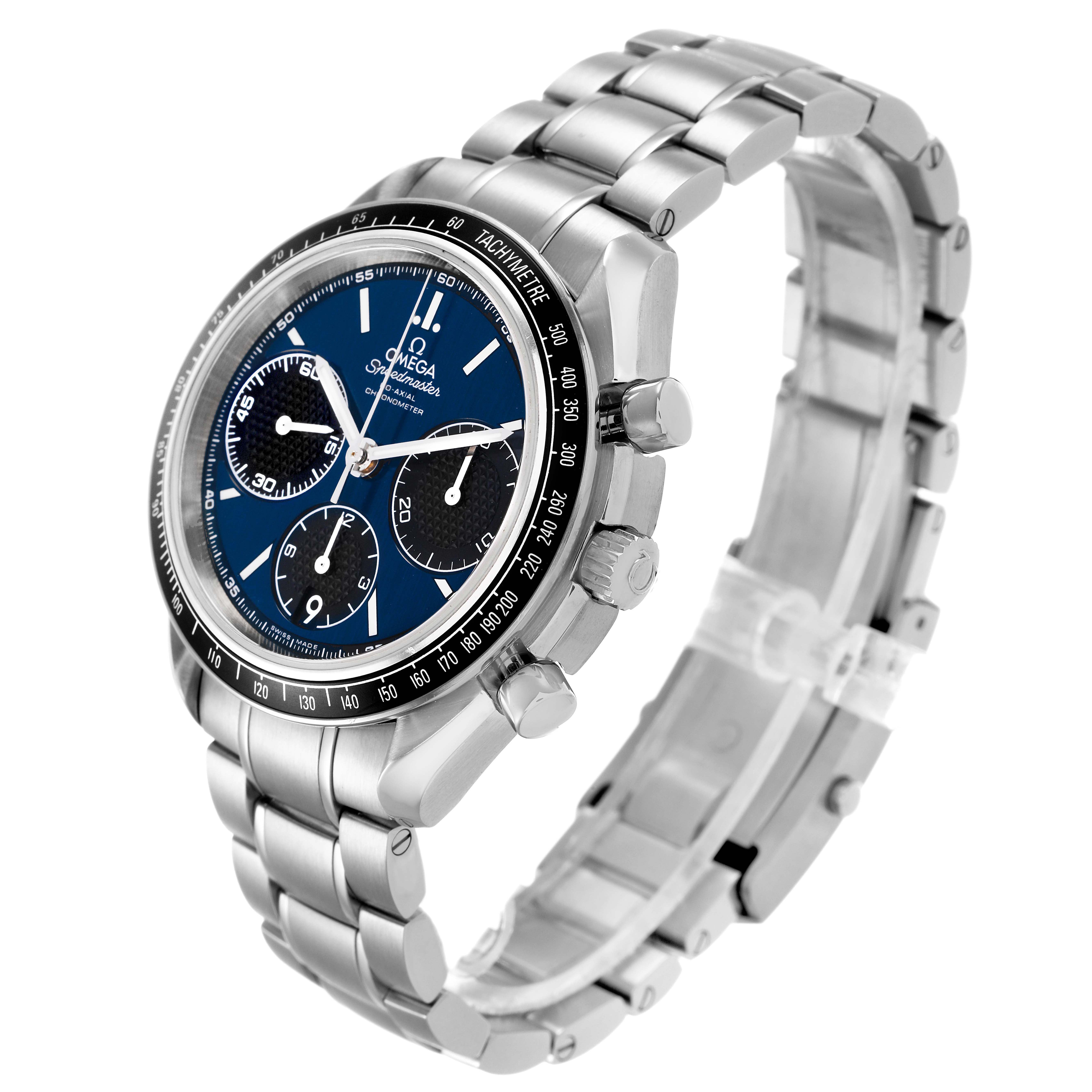 The Omega Speedmaster 326.30.40.50.03.001 Men's Stainless Steel Blue Dial watch is shown in a three-quarter angle, highlighting the face, bezel, crown, and bracelet.