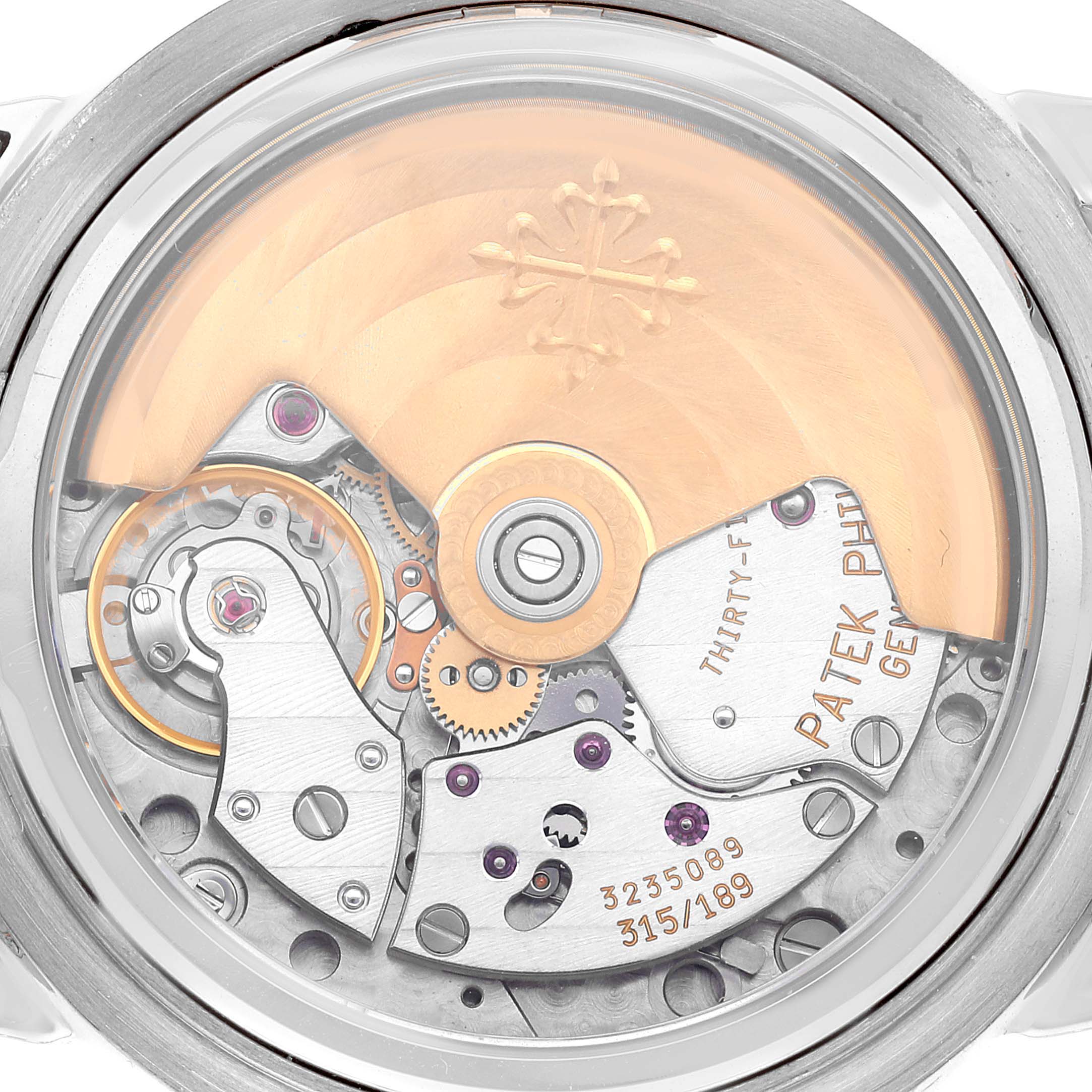 This image shows the movement and inner mechanics of a Patek Philippe Complications 5150G Men's White Gold Silver Dial 5150G Men's White Gold Silver Dial watch from the back angle.