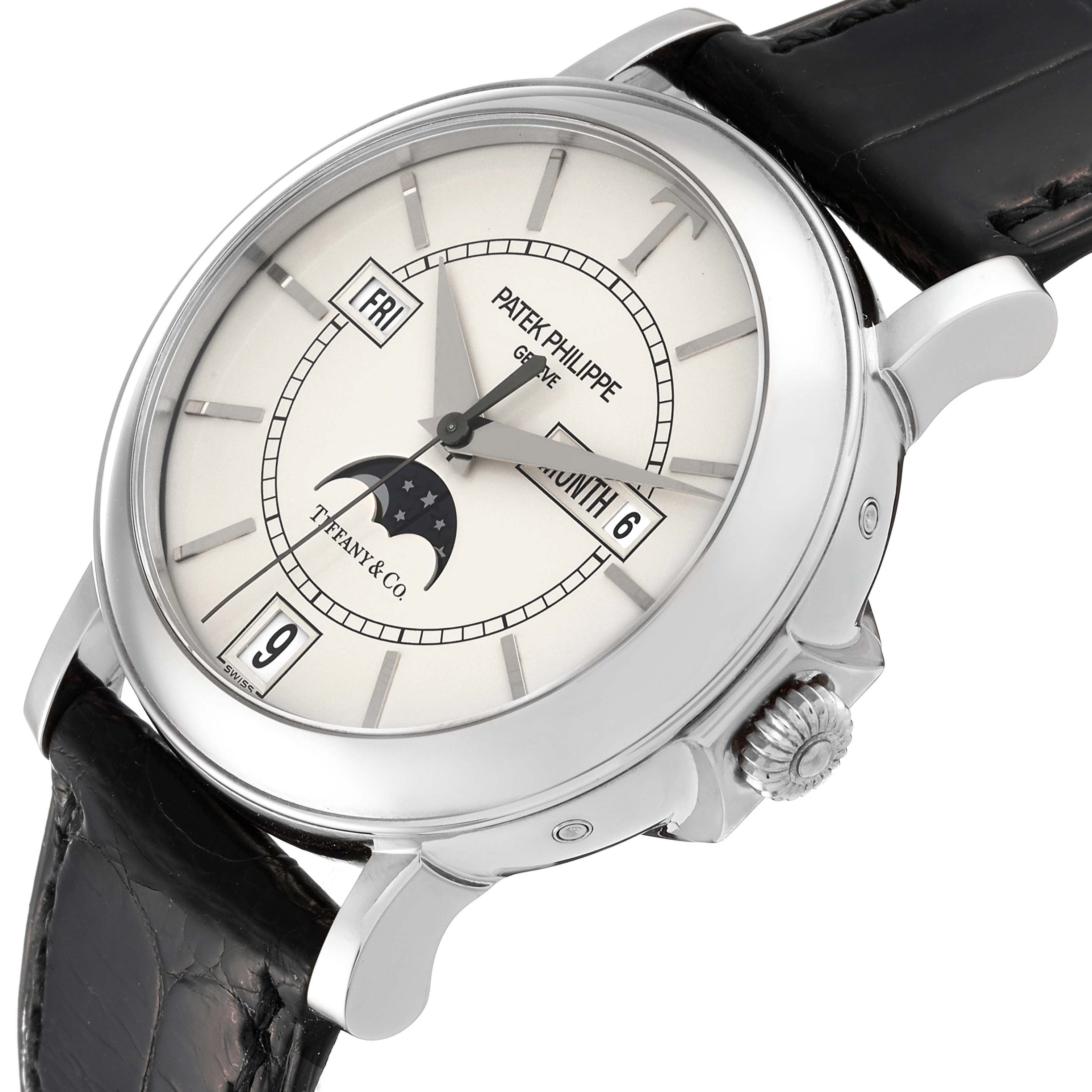 The image shows a Patek Philippe Complications 5150G Men's White Gold Silver Dial 5150G Men's White Gold Silver Dial model watch at an angled view, highlighting the dial, date displays, and crown.