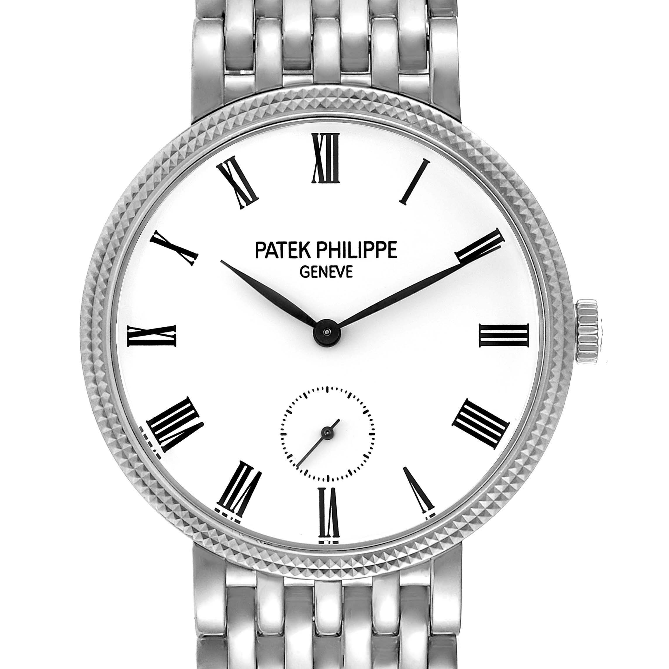 The image shows a front view of the Patek Philippe Calatrava 7119G Women's White Gold White Dial 7119G Women's White Gold White Dial watch, highlighting its dial, Roman numerals, and part of the metal bracelet.