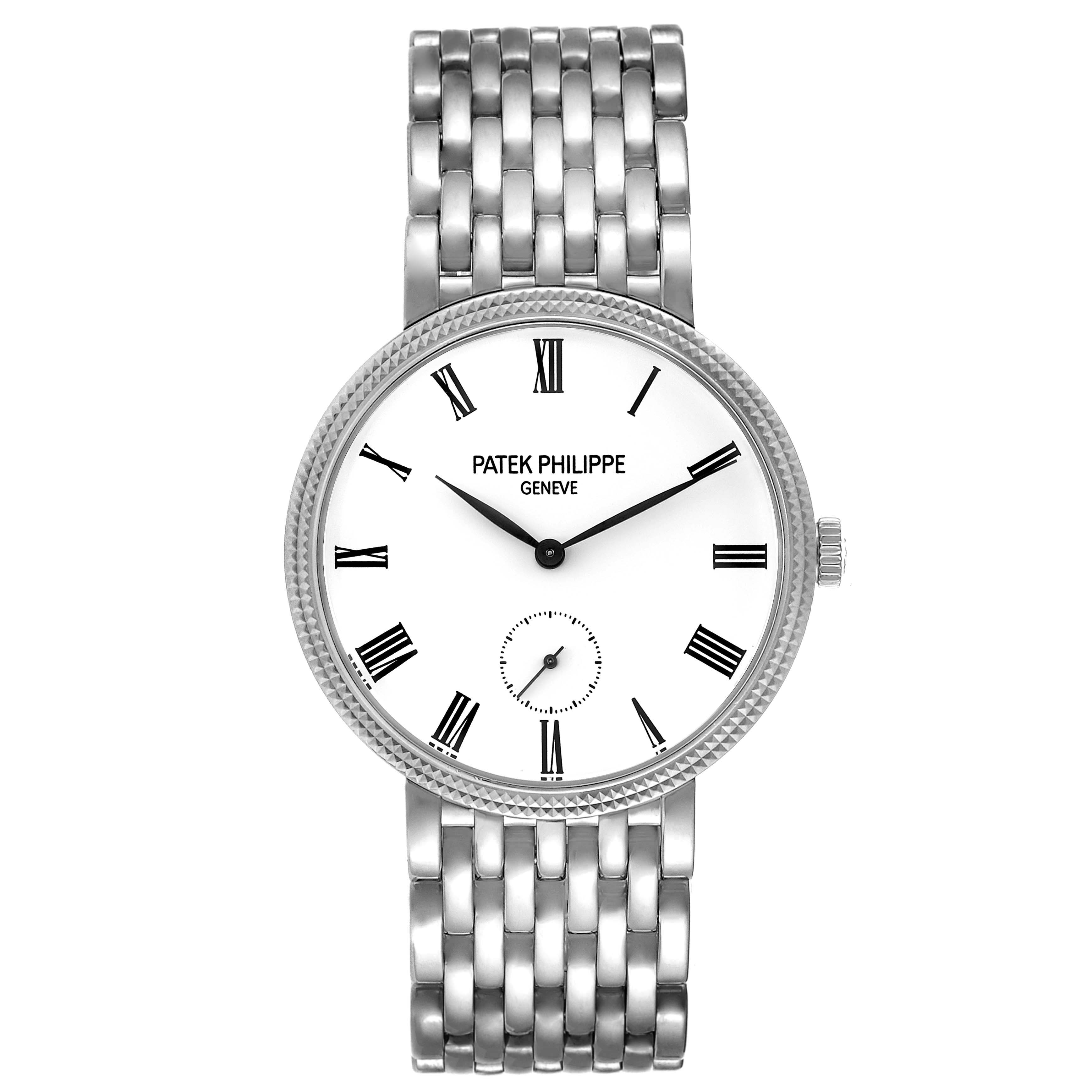 The image shows a front view of a Patek Philippe Calatrava 7119G Women's White Gold White Dial 7119G Women's White Gold White Dial watch with a silver bracelet and Roman numeral markers.