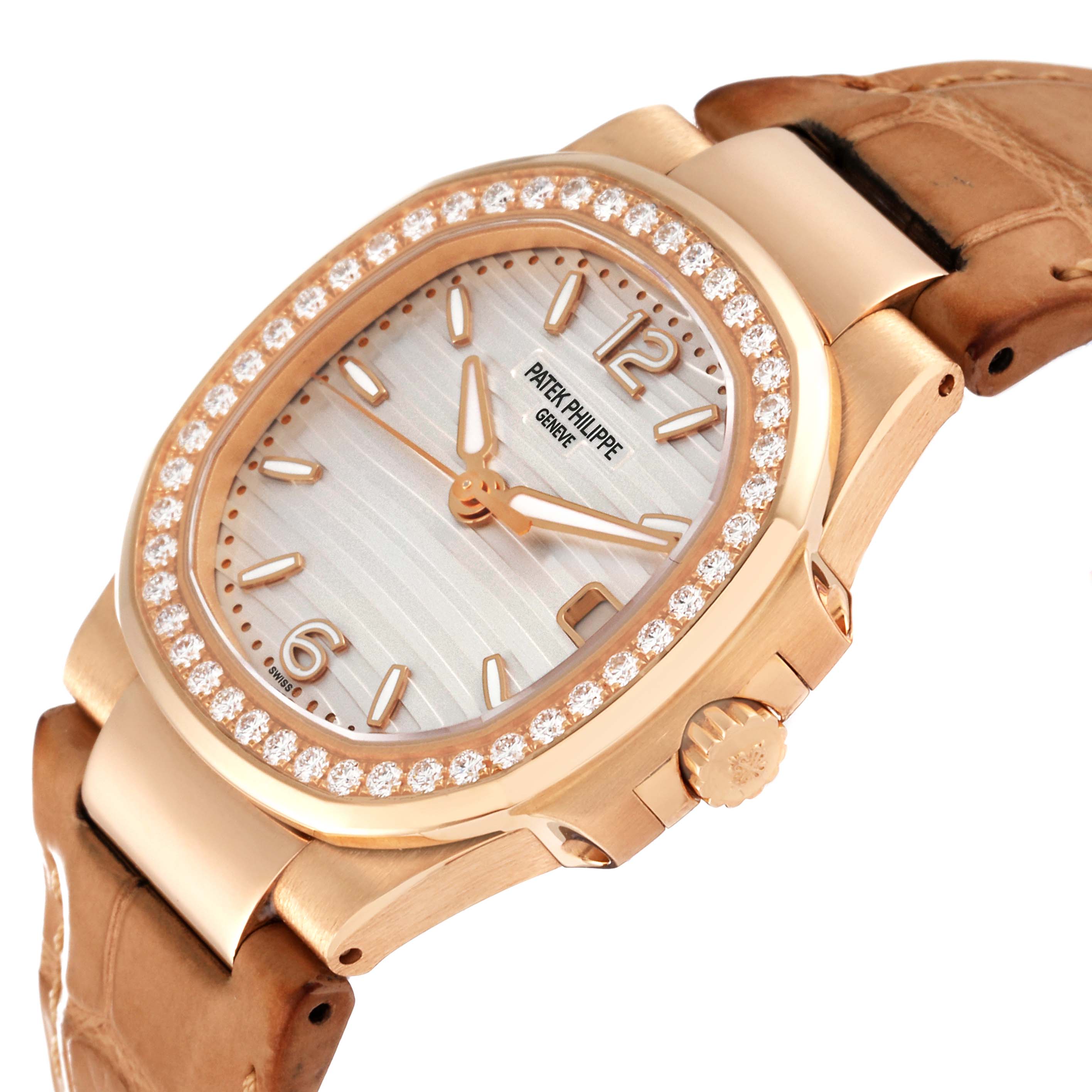 The image shows a Patek Philippe Nautilus 7010R Women's Rose Gold Silver Dial 7010R Women's Rose Gold Silver Dial watch angled from the front-right, highlighting the case, bezel, and part of the strap.