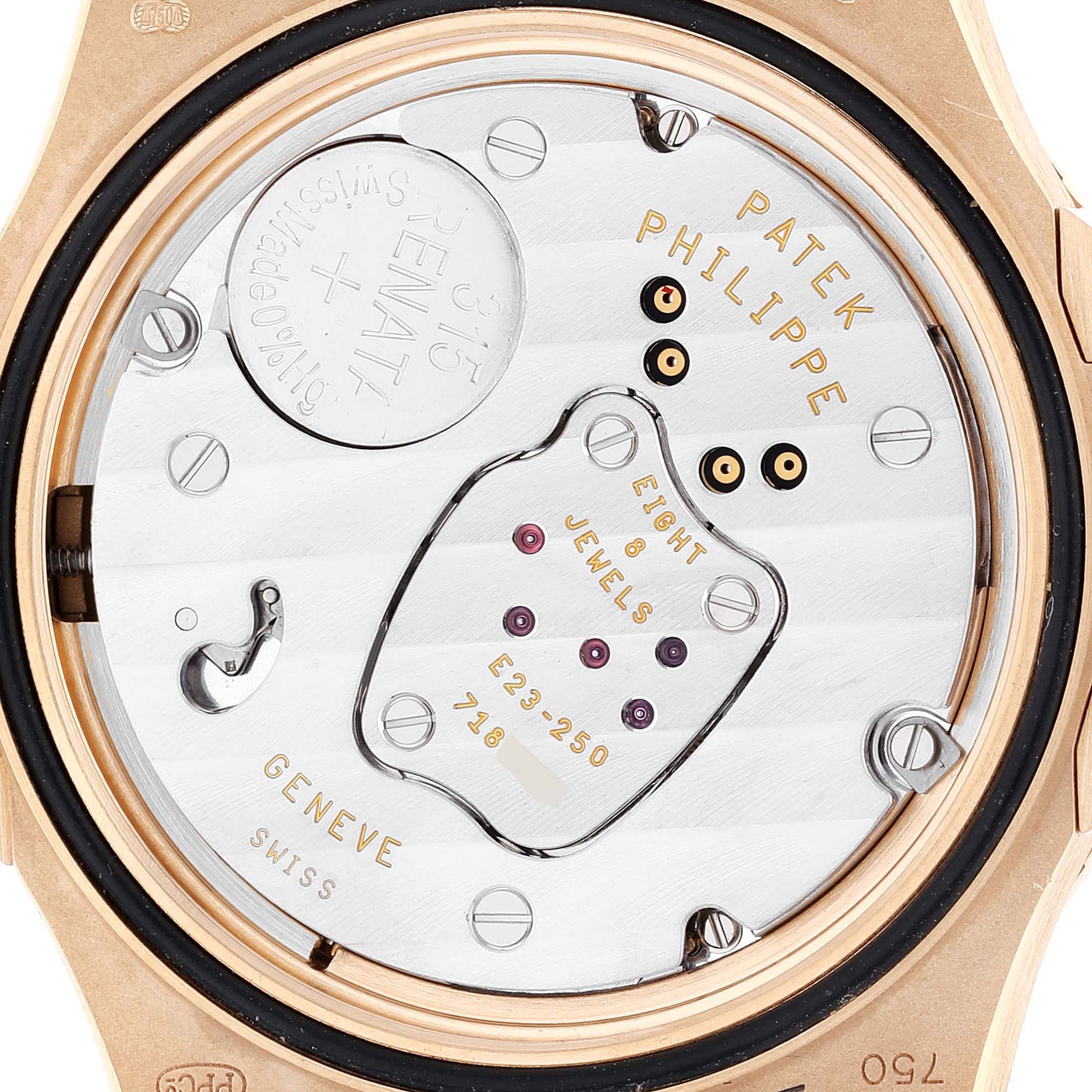 This image shows the back of the Patek Philippe Nautilus 7010R Women's Rose Gold Silver Dial 7010R Women's Rose Gold Silver Dial watch, revealing its intricate movement components.