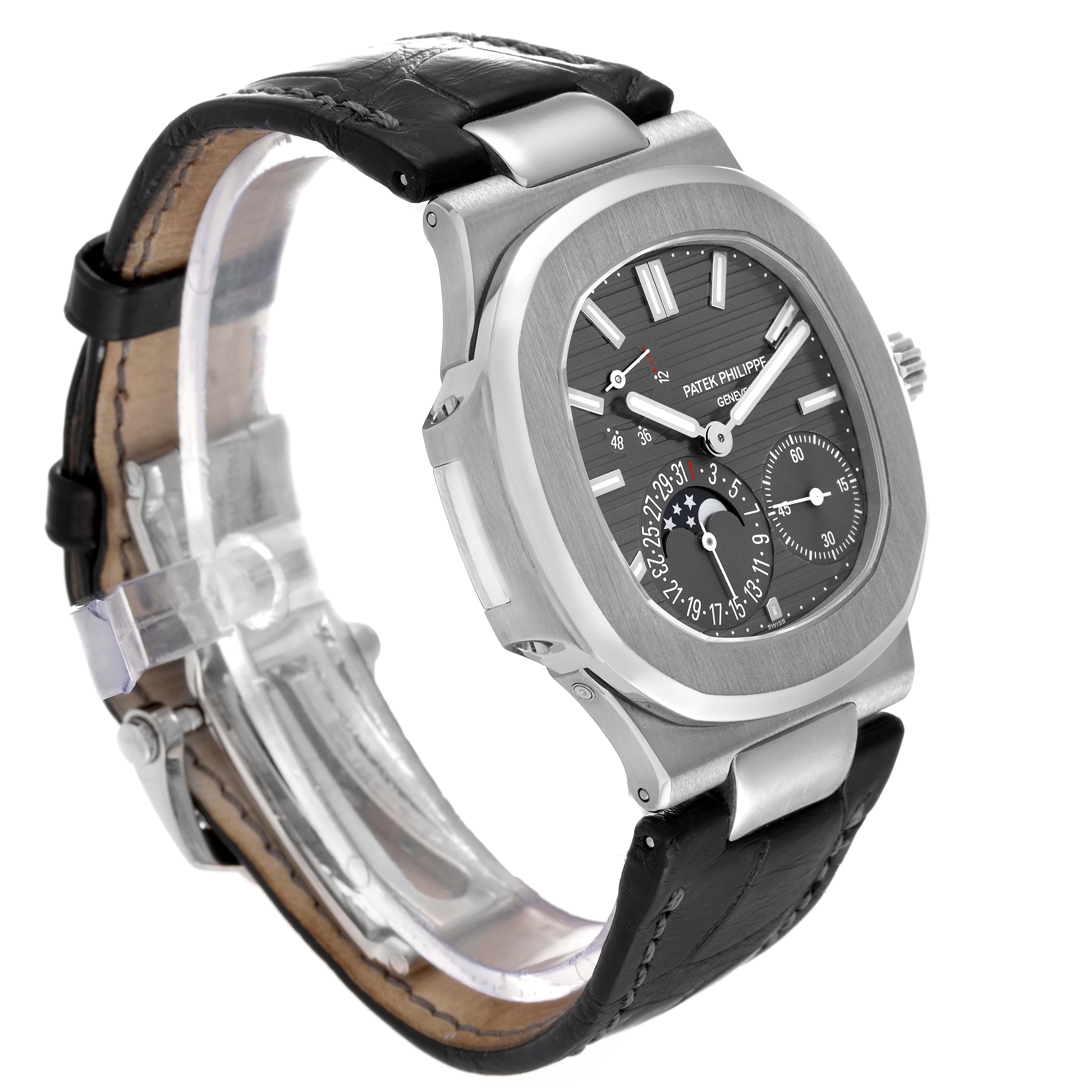 The image shows a side and front angle view of a Patek Philippe Nautilus 5712G-001 Men's White Gold Grey Dial 5712G-001 Men's White Gold Grey Dial watch, highlighting its dial and leather strap.