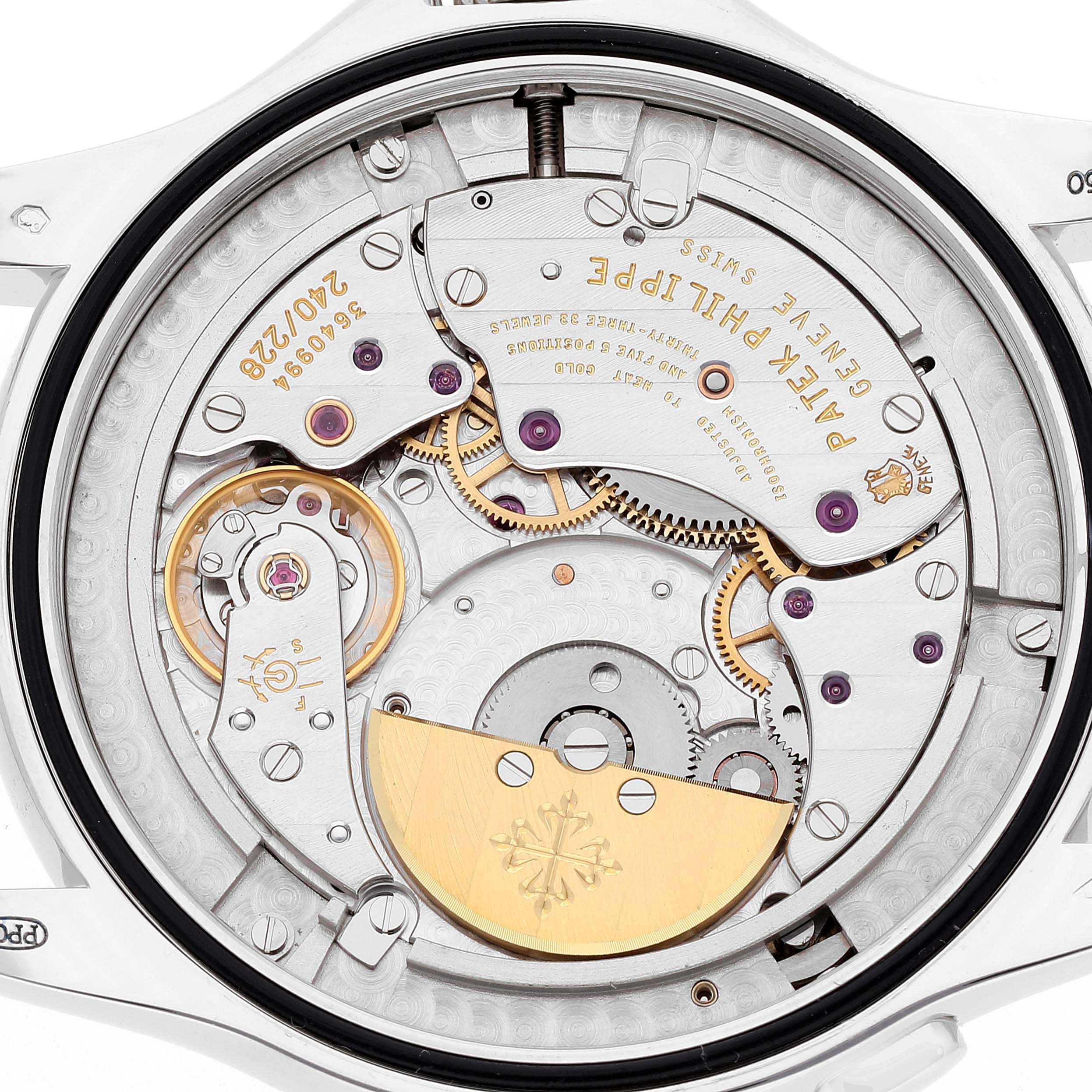 This image shows the intricate back view of the mechanical movement in a Patek Philippe Complications 5130P-001 Men's Platinum Silver Dial 5130P-001 Men's Platinum Silver Dial watch.