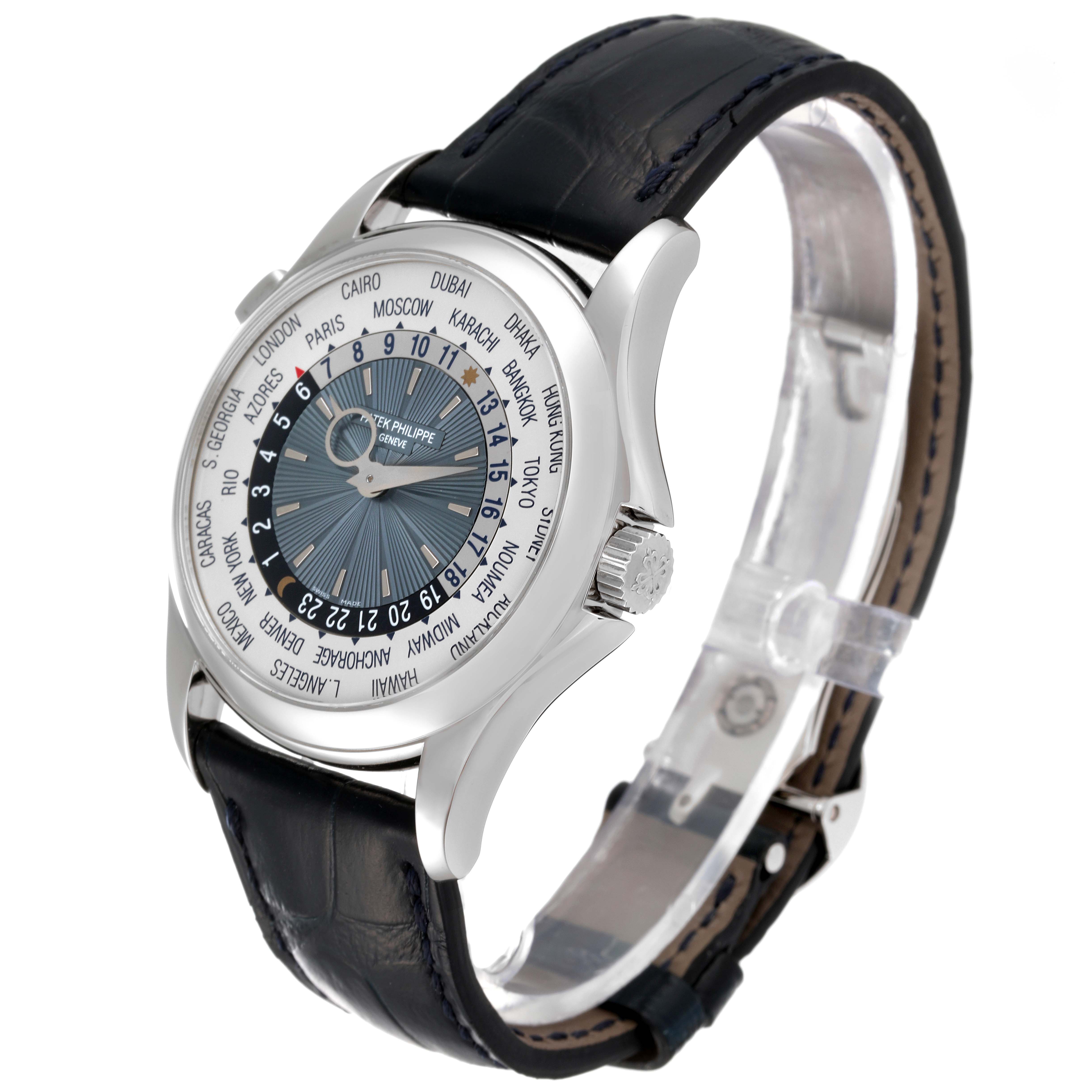 The Patek Philippe Complications 5130P-001 Men's Platinum Silver Dial 5130P-001 Men's Platinum Silver Dial watch is shown at an angle displaying its face, crown, and part of the leather strap.