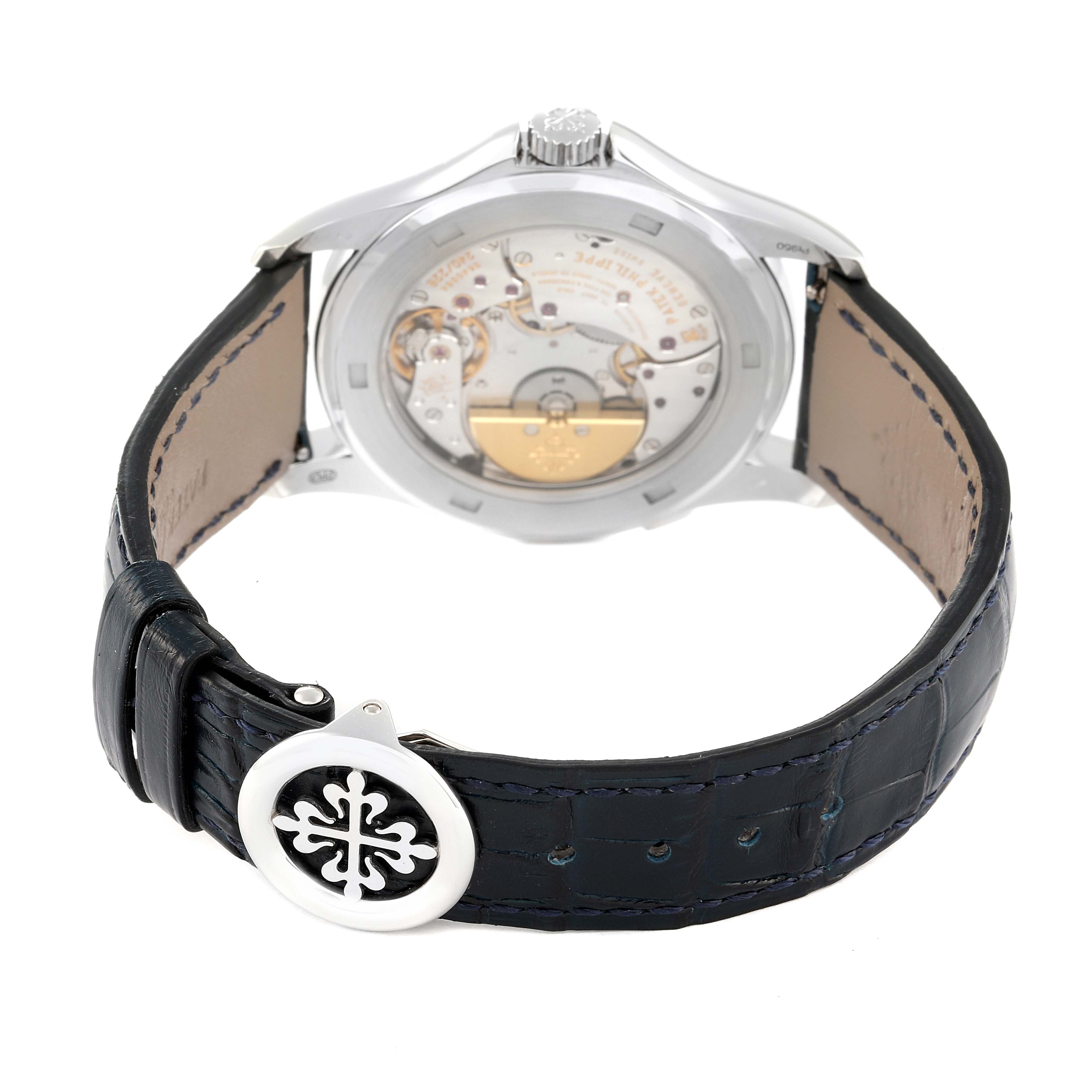 This Patek Philippe Complications 5130P-001 Men's Platinum Silver Dial 5130P-001 Men's Platinum Silver Dial model is shown from the back, highlighting the movement and leather strap.