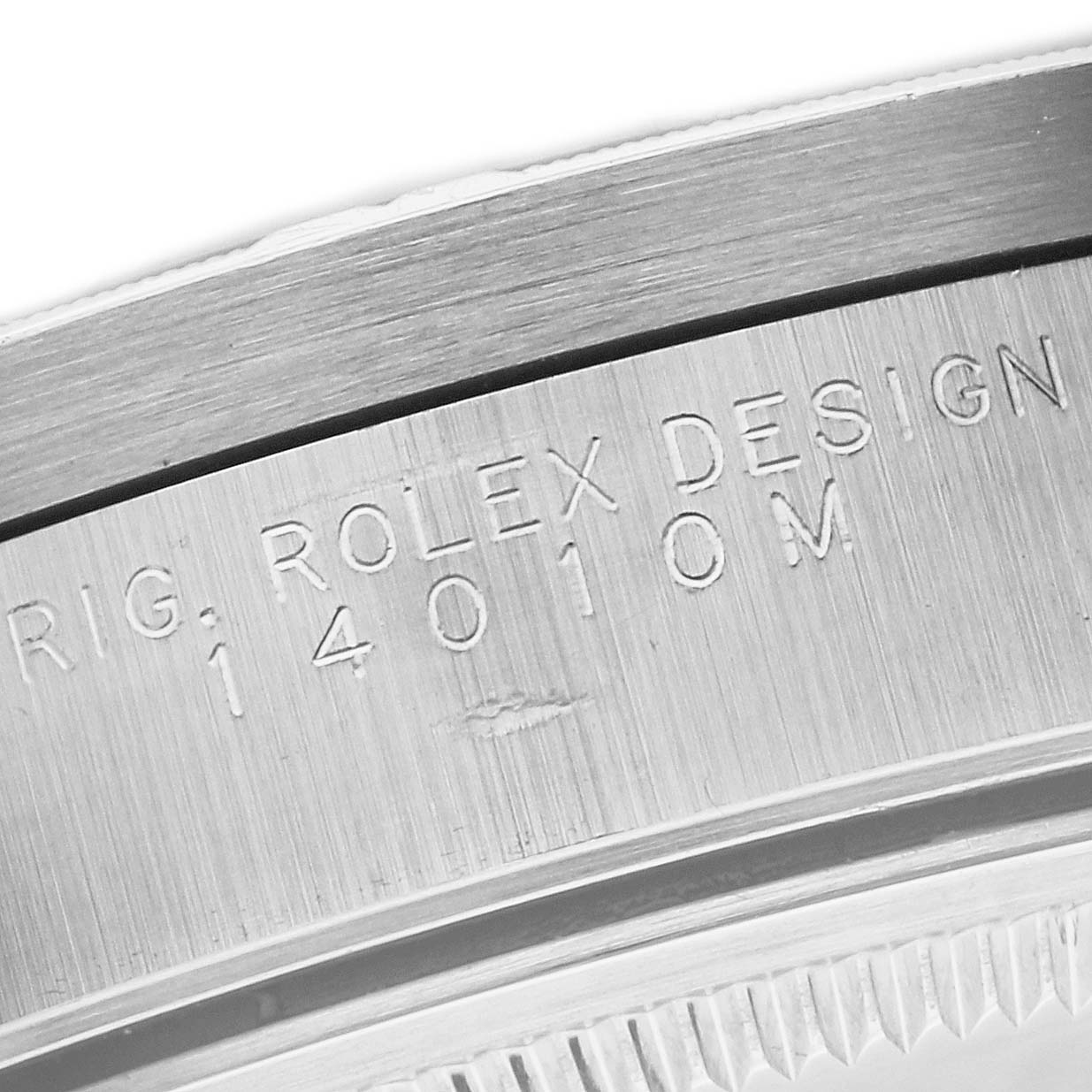 Image shows a close-up of the engraving on the bezel of a Rolex Air-King 14010 Men's Stainless Steel Black Dial 14010 Men's Stainless Steel Black Dial watch.