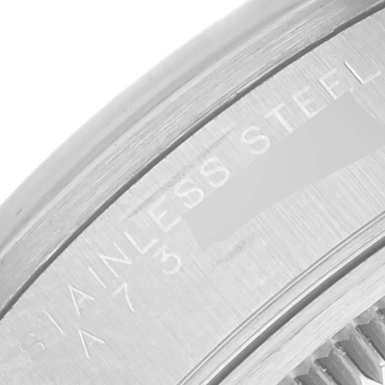 This close-up image shows the stainless steel edge and serial engraving of a Rolex Date 15200 Men's Stainless Steel Silver Dial 15200 Men's Stainless Steel Silver Dial model watch.