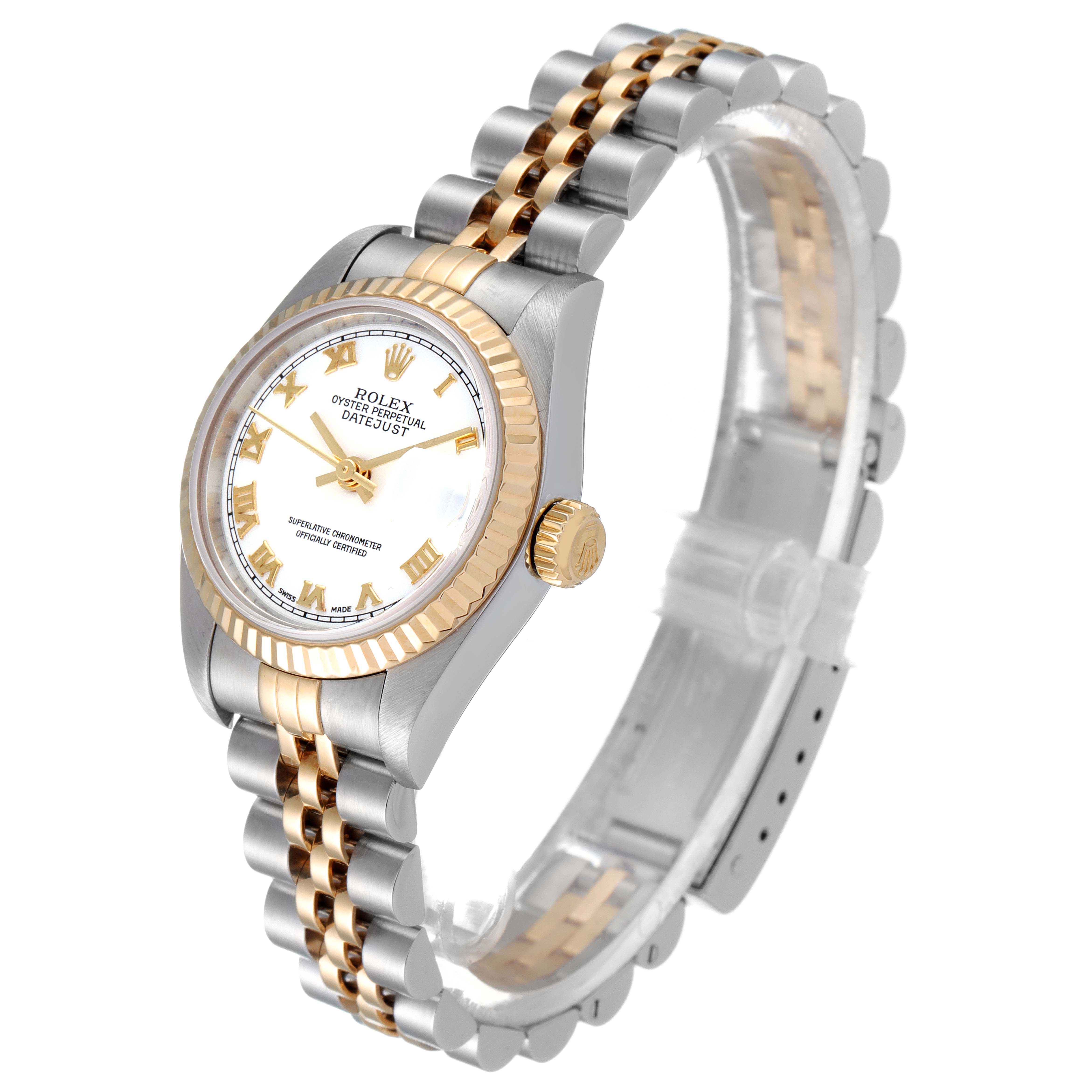 This Rolex Datejust 79173 Women
s Steel and Gold (two tone) White Dial 79173 Women
s Steel and Gold (two tone) White Dial watch is shown at an angled side view, highlighting its dial, bezel, and two-tone jubilee bracelet.