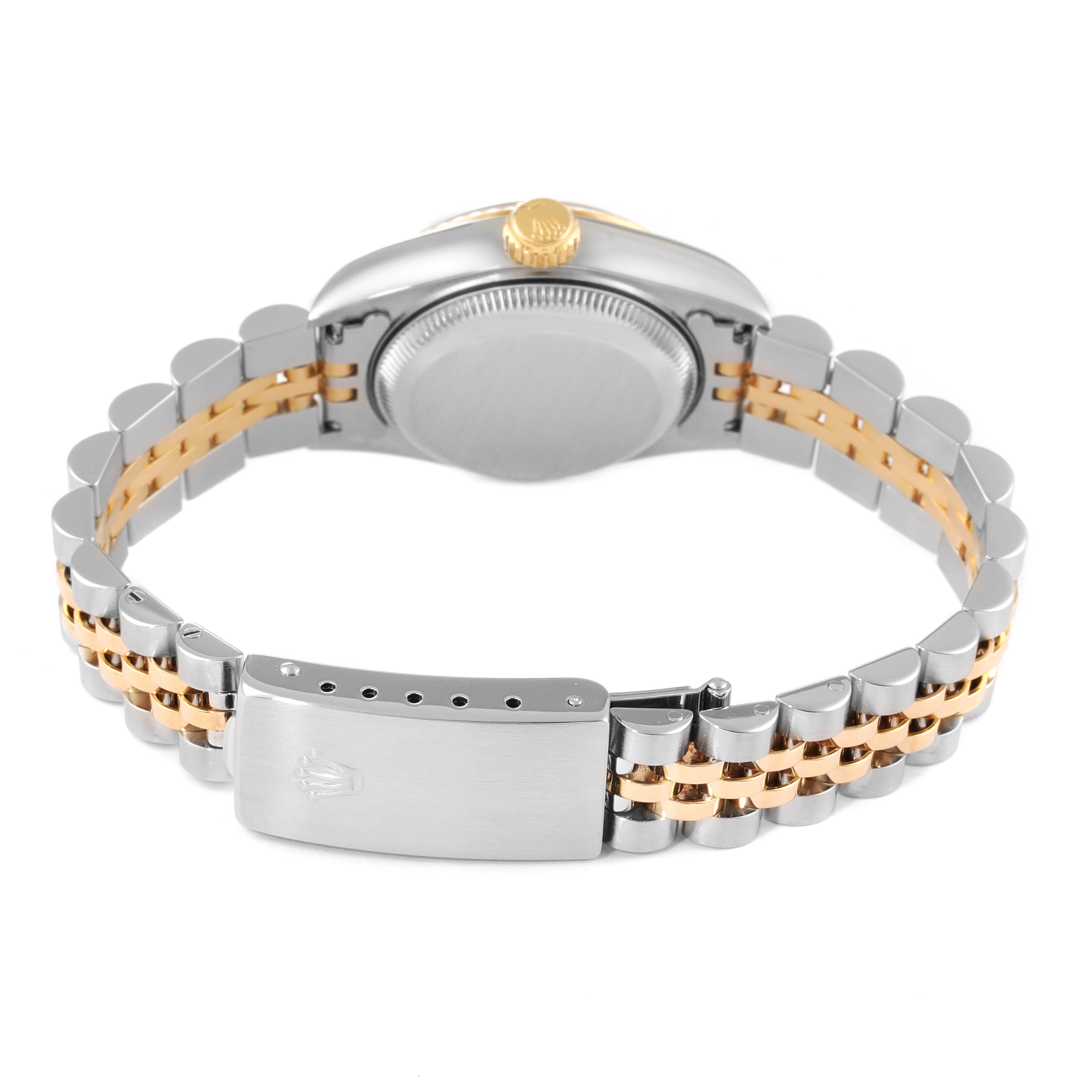 The image shows the back of the Rolex Datejust 69173 Women
s Steel and Gold (two tone) Champagne Dial 69173 Women
s Steel and Gold (two tone) Champagne Dial watch, highlighting the case back, crown, and the jubilee bracelet with the clasp.