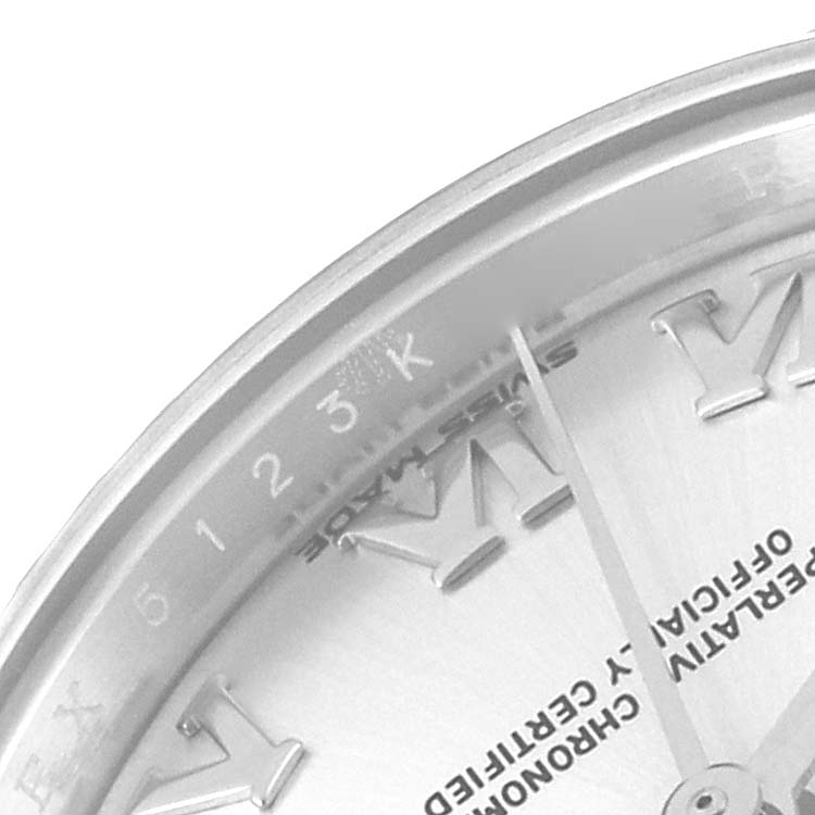 This image shows a close-up of the upper-left quadrant of the dial and bezel of a Rolex Datejust 279174 Women's Stainless Steel Silver Dial 279174 Women's Stainless Steel Silver Dial watch.