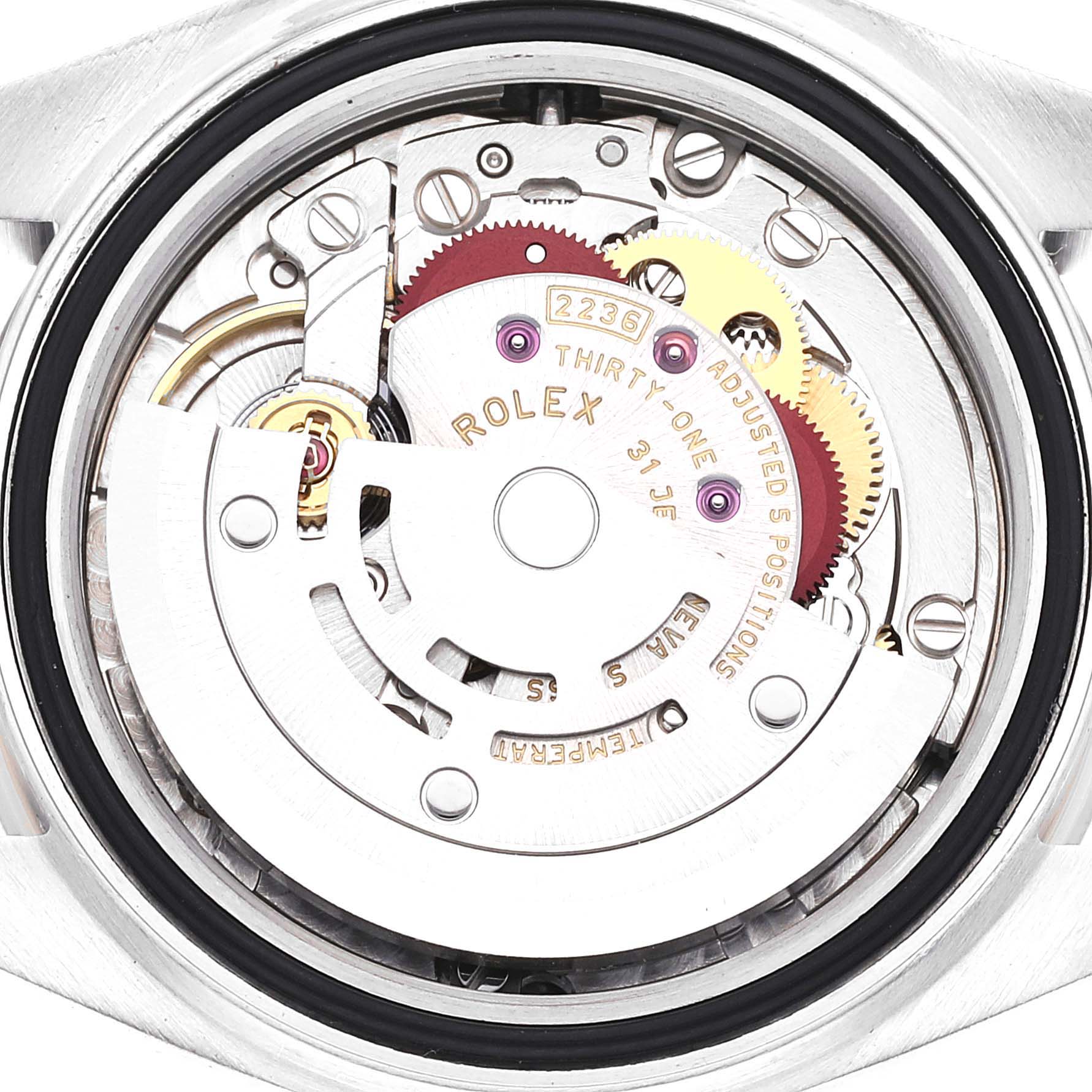 The angle shows the inner mechanism of the Rolex Datejust 279174 Women's Stainless Steel Silver Dial 279174 Women's Stainless Steel Silver Dial watch, featuring gears and the rotor.