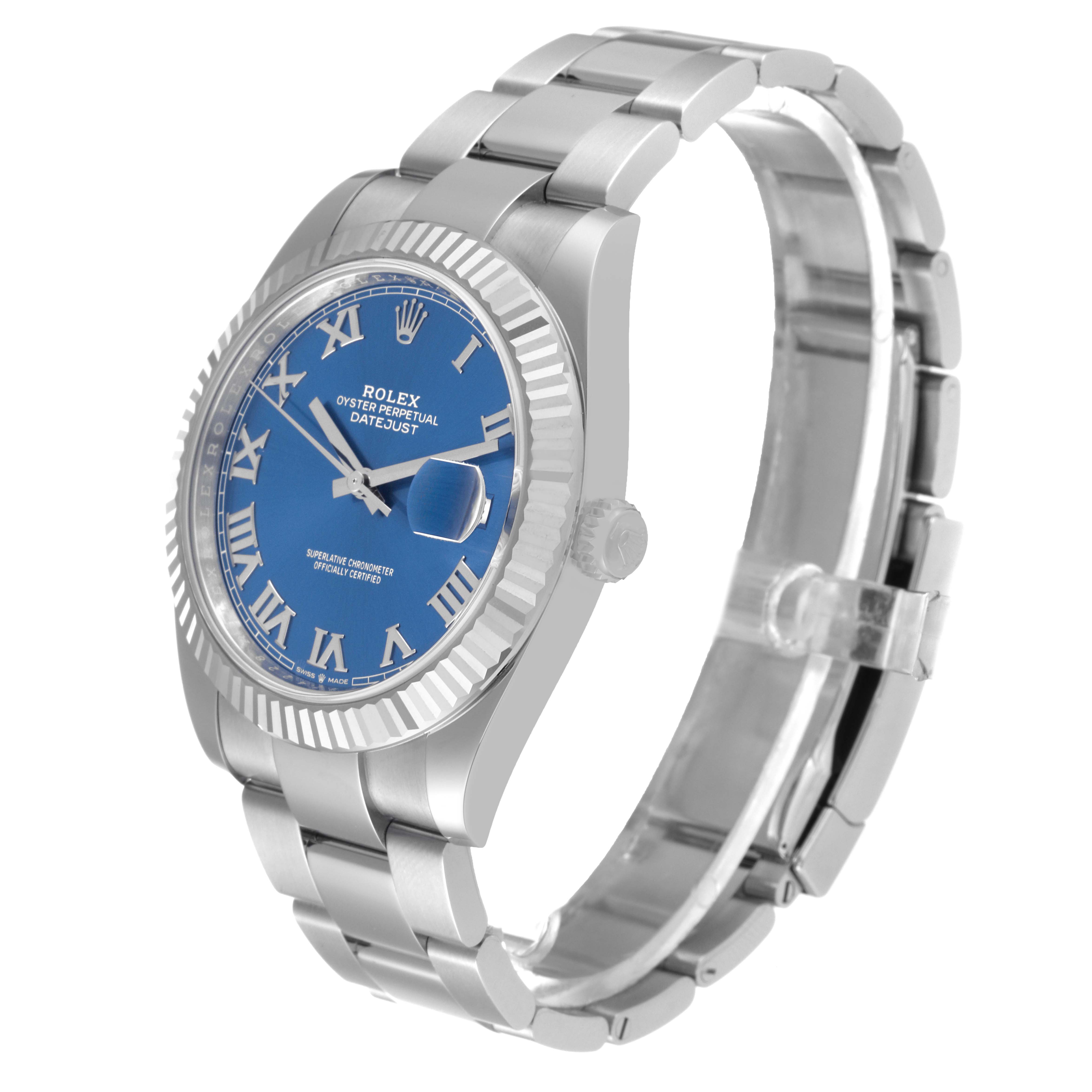 The image shows a side angle of a Rolex Datejust 41 126334 Men
s Stainless Steel Blue Dial 126334 Men
s Stainless Steel Blue Dial watch, highlighting the blue dial, fluted bezel, and oyster bracelet.