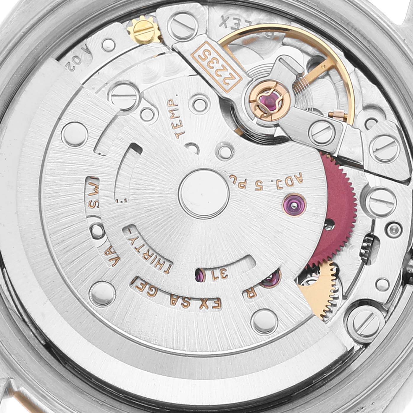 This image showcases a close-up view of the movement mechanism of a Rolex Datejust 79173 Women's Steel and Gold (two tone) Champagne Dial 79173 Women's Steel and Gold (two tone) Champagne Dial watch.