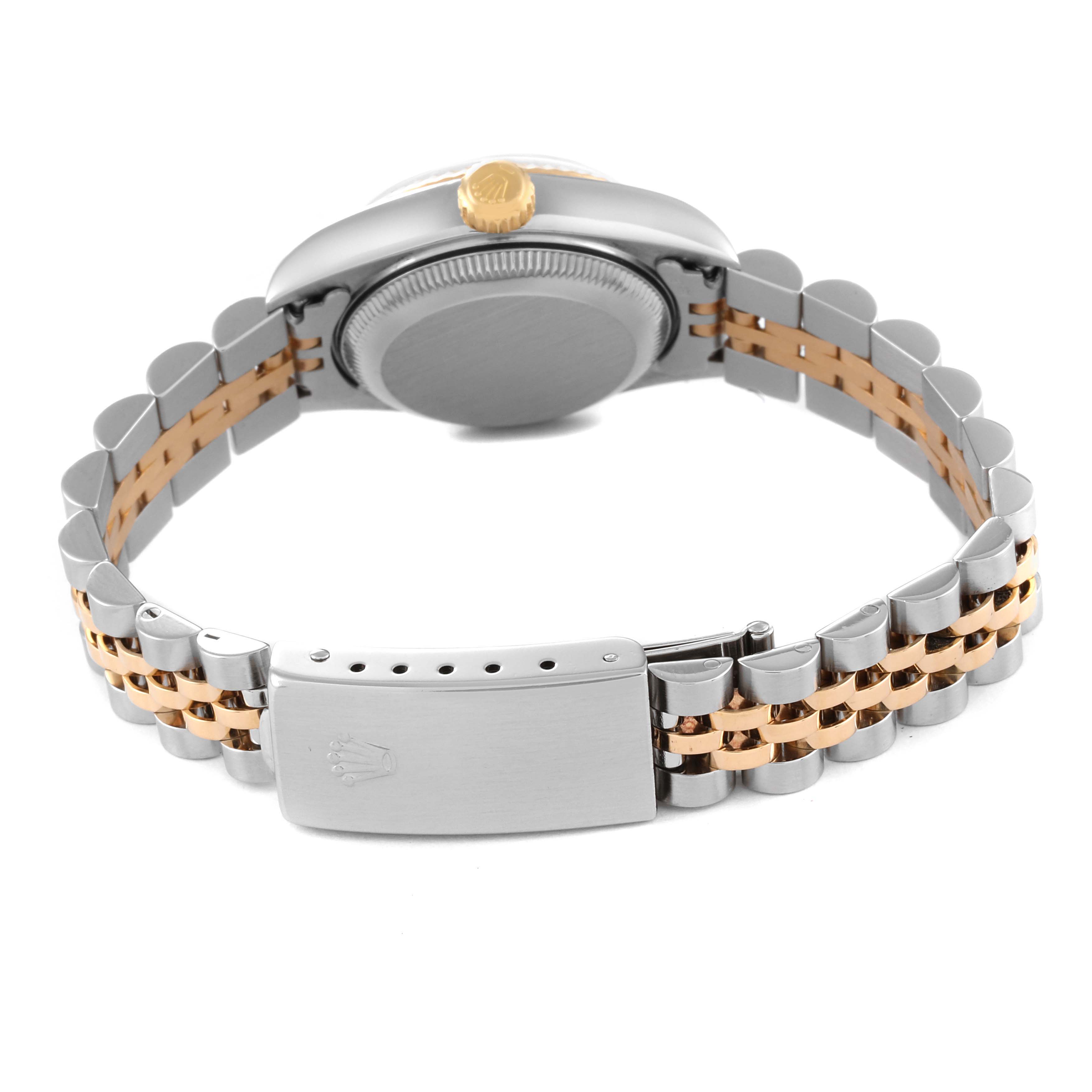 This image shows the back view of the Rolex Datejust 79173 Women's Steel and Gold (two tone) Champagne Dial 79173 Women's Steel and Gold (two tone) Champagne Dial watch, highlighting the clasp and stainless steel and gold bracelet.