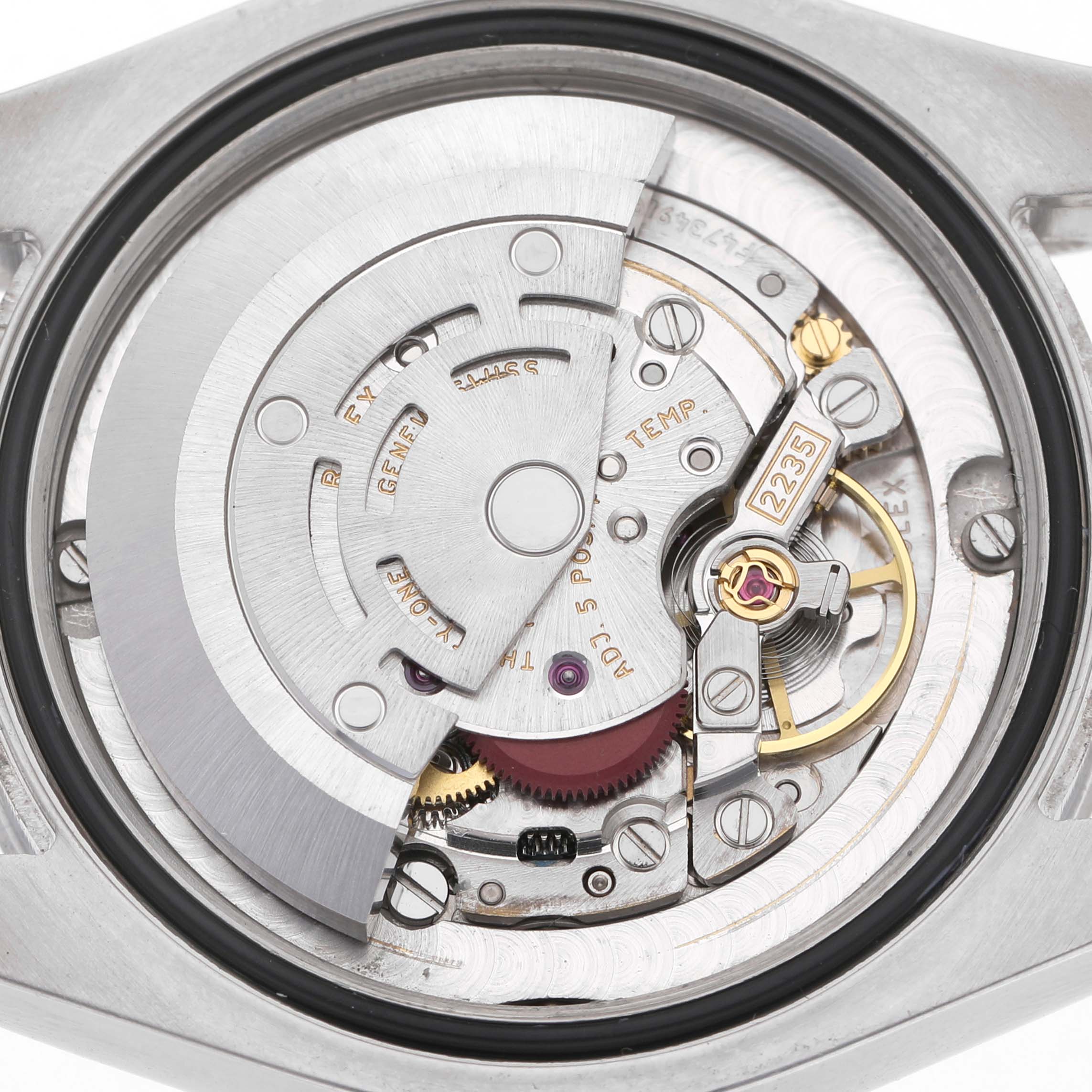 The image shows the movement of a Rolex Datejust 178240 Women's Stainless Steel Pink Dial watch viewed from the back, highlighting the rotor and balance wheel components.