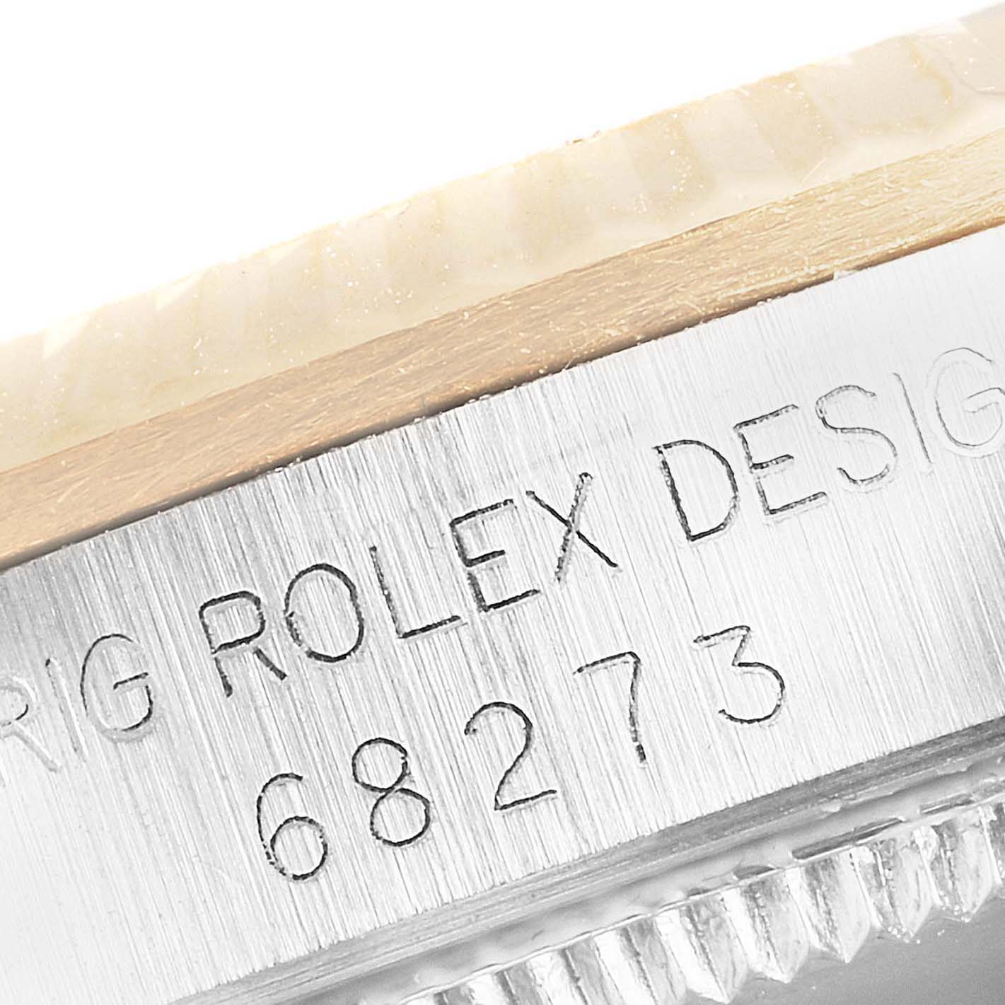 The image shows a close-up of a Mid-Size Rolex watch case, highlighting the model number "68273" and the text "ROLEX DESIGN."