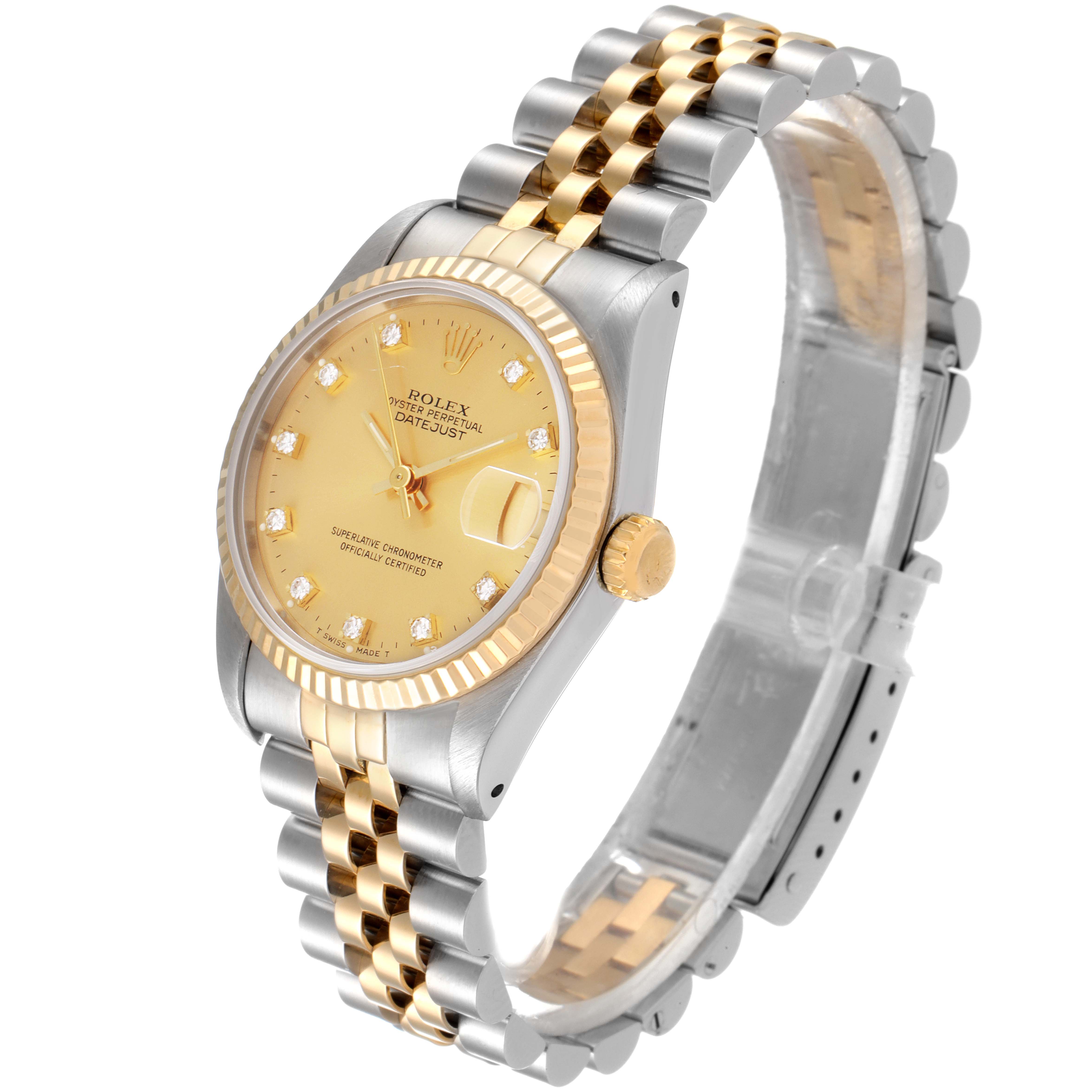 The image shows a Rolex Mid-Size 68273 Women's Steel and Gold (two tone) Champagne Dial 68273 Women's Steel and Gold (two tone) Champagne Dial Datejust watch from a front-angle, highlighting its gold and silver bracelet, dial, and crown.
