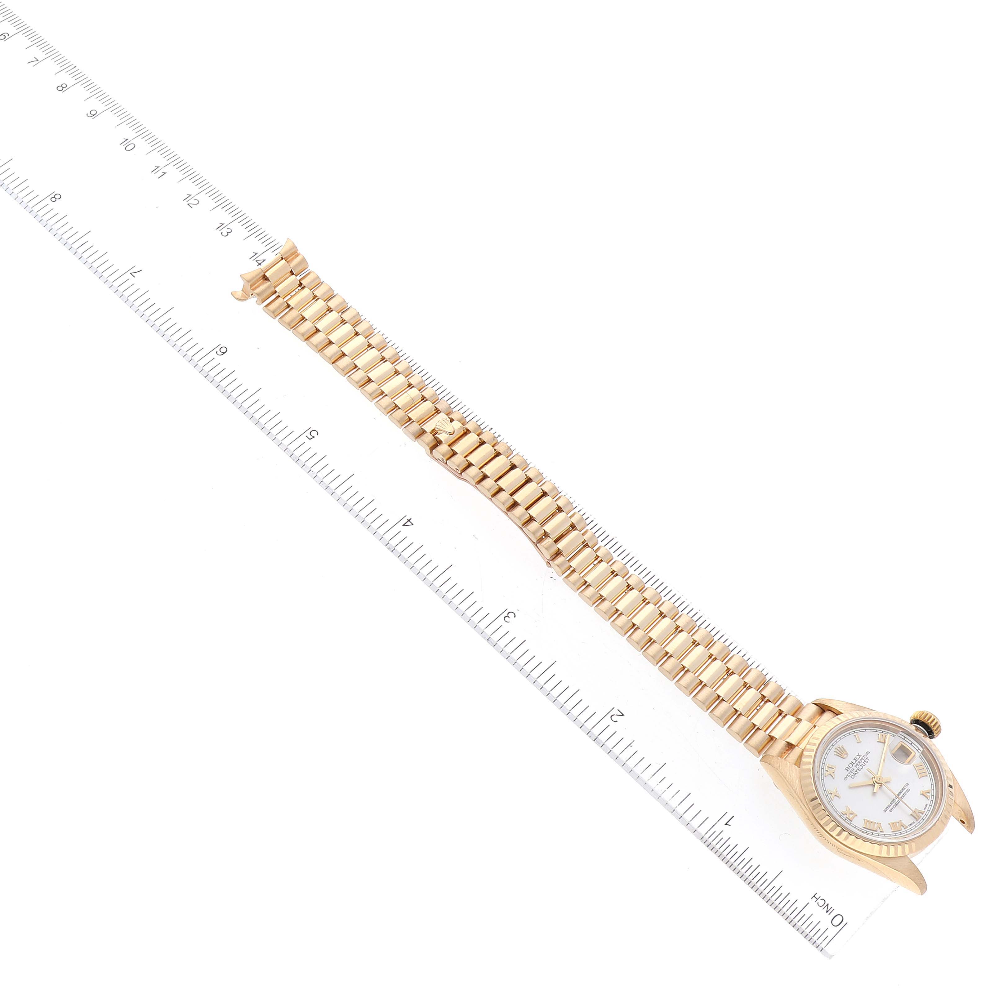 The image shows a Rolex President 69178 Women's Yellow Gold Mother of Pearl Dial 69178 Women's Yellow Gold Mother of Pearl Dial watch laid flat with a ruler for measurement.