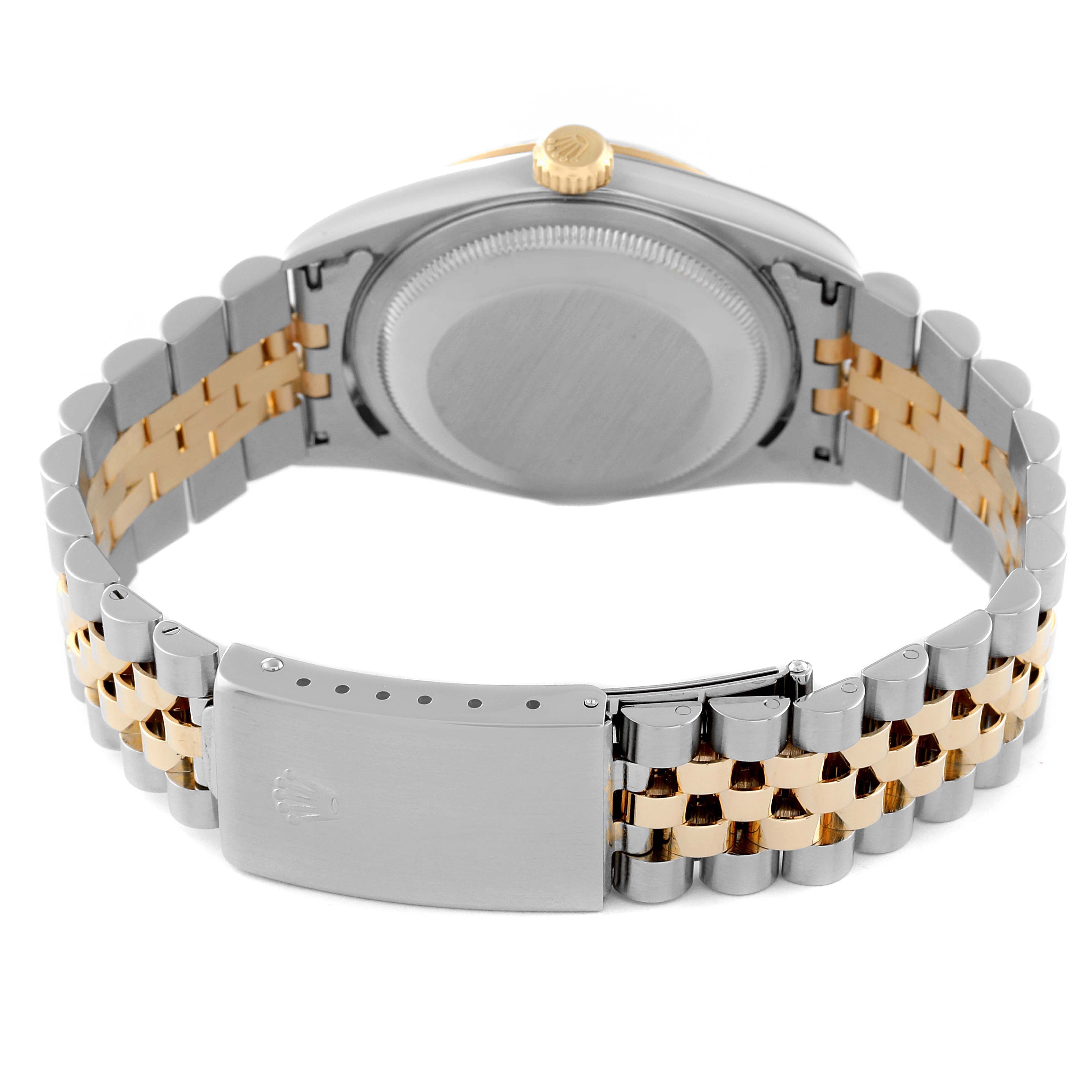The image shows the back view of a Rolex Datejust 16233 Men's Steel and Gold (two tone) Champagne Dial 16233 Men's Steel and Gold (two tone) Champagne Dial watch, highlighting the case back and two-tone metal bracelet with clasp.