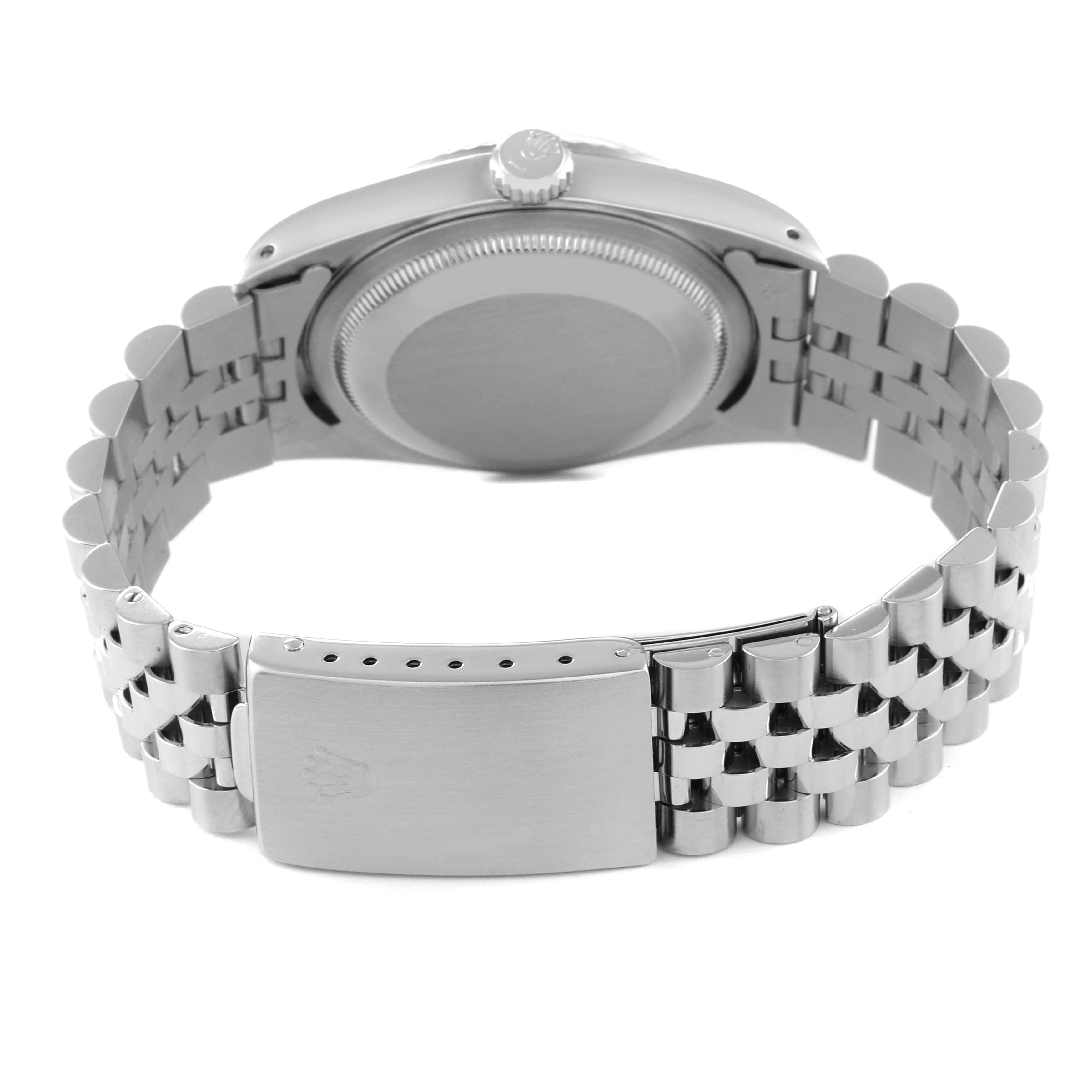 This image shows the back view of a Rolex Datejust 16234 Men's Stainless Steel Silver Dial 16234 Men's Stainless Steel Silver Dial watch, featuring the case back and the bracelet with the clasp.