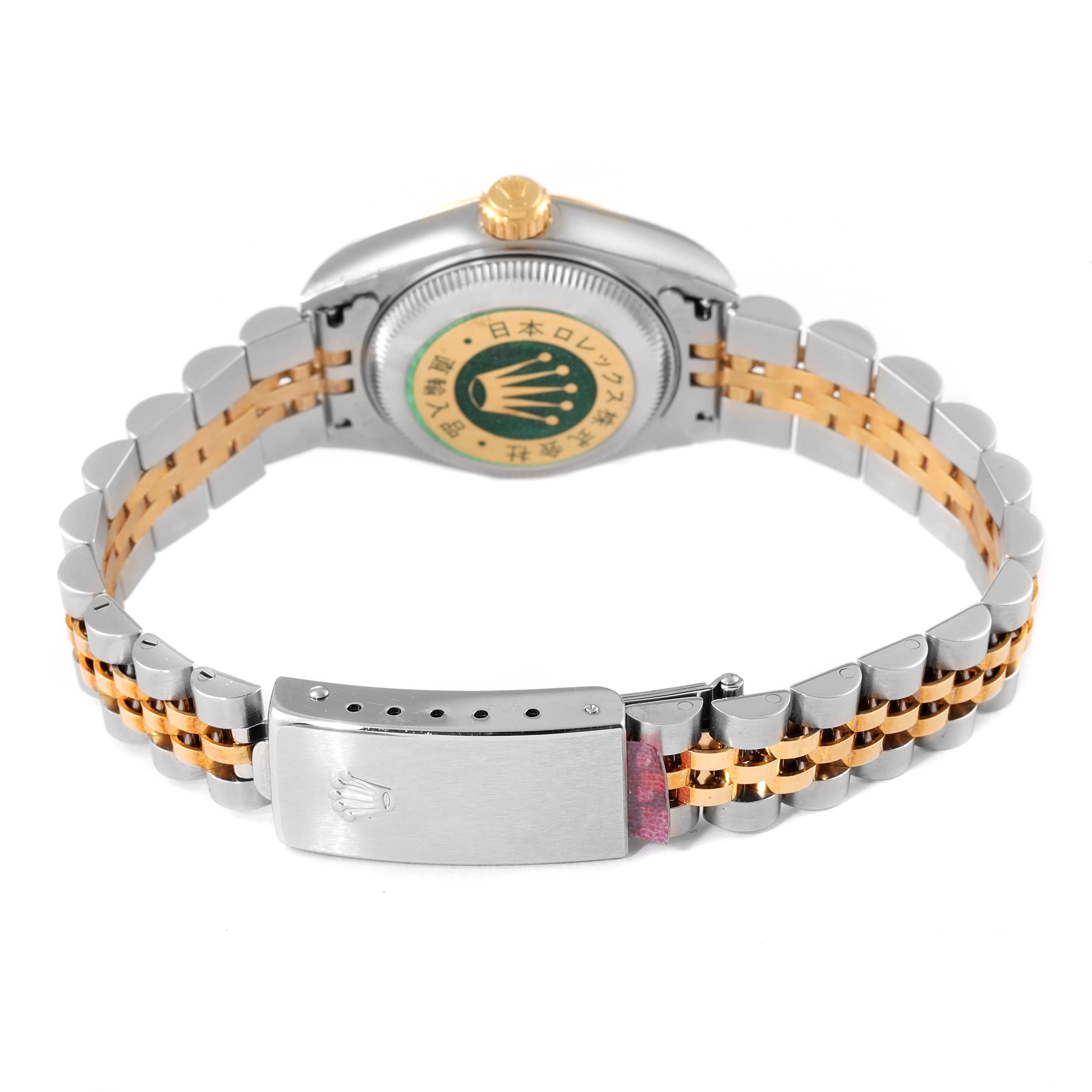 The image shows the back view of a Rolex Datejust 79173 Women
s Steel and Gold (two tone) Mother of Pearl Dial 79173 Women
s Steel and Gold (two tone) Mother of Pearl Dial watch, highlighting the case back, crown, and two-tone bracelet and clasp.