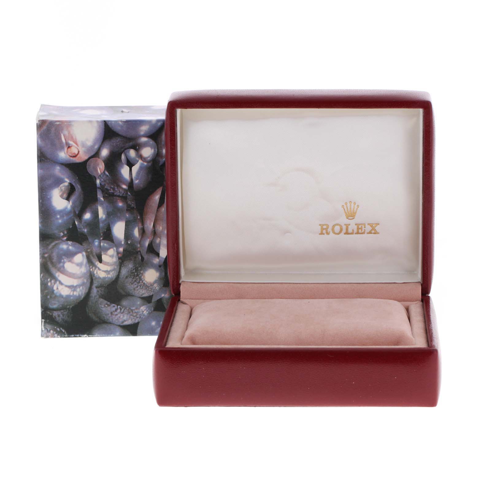 The image shows an open watch box for a Rolex Datejust 79173 Women
s Steel and Gold (two tone) Mother of Pearl Dial 79173 Women
s Steel and Gold (two tone) Mother of Pearl Dial model with a cushion inside.