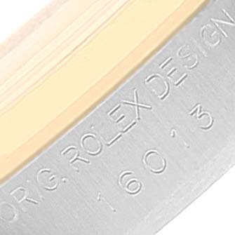 This close-up image shows the engravings on the side of the case of a Vintage Collection Rolex watch, model number 16013.