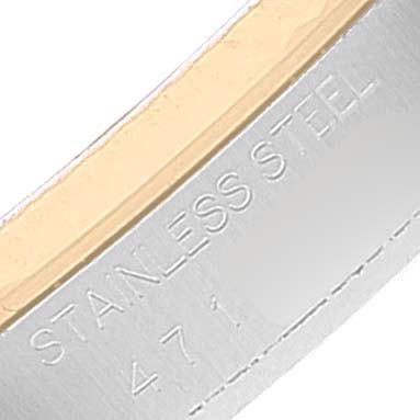 This is a close-up image showing the stainless steel part of a Vintage Collection Rolex watch's bracelet or case with engraved text.