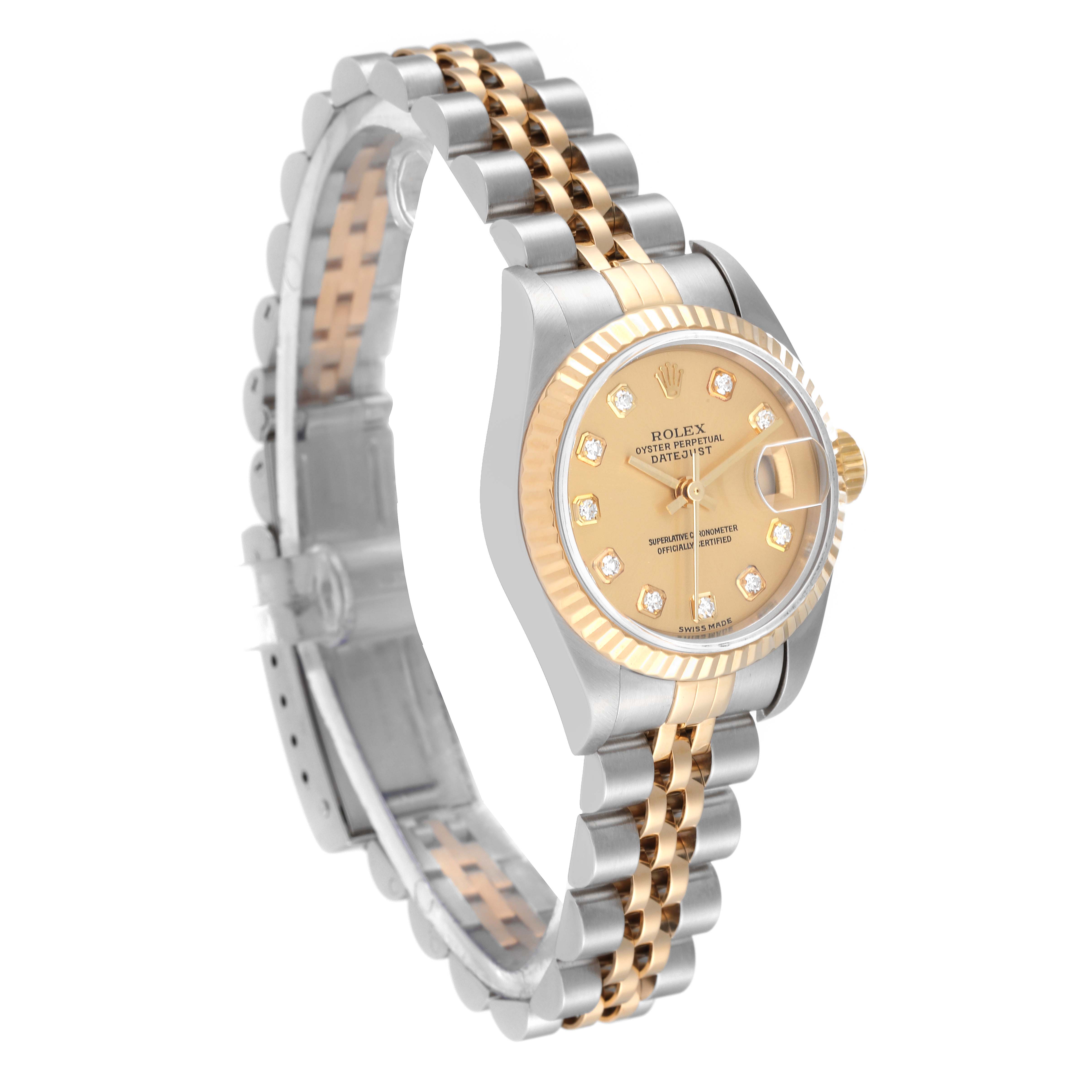 This image shows a side-angle view of a Rolex Datejust 79173 Women's Steel and Gold (two tone) Champagne Dial 79173 Women's Steel and Gold (two tone) Champagne Dial watch, displaying its Jubilee bracelet, fluted bezel, and champagne dial.