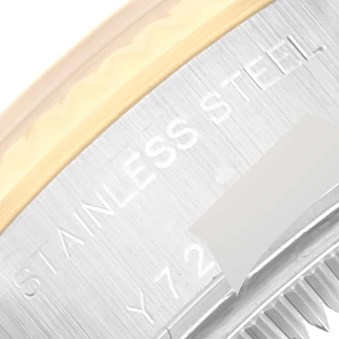 This image shows a close-up of the case back of a Rolex Datejust 79173 Women's Steel and Gold (two tone) Champagne Dial 79173 Women's Steel and Gold (two tone) Champagne Dial watch, highlighting the engraved text "STAINLESS STEEL."
