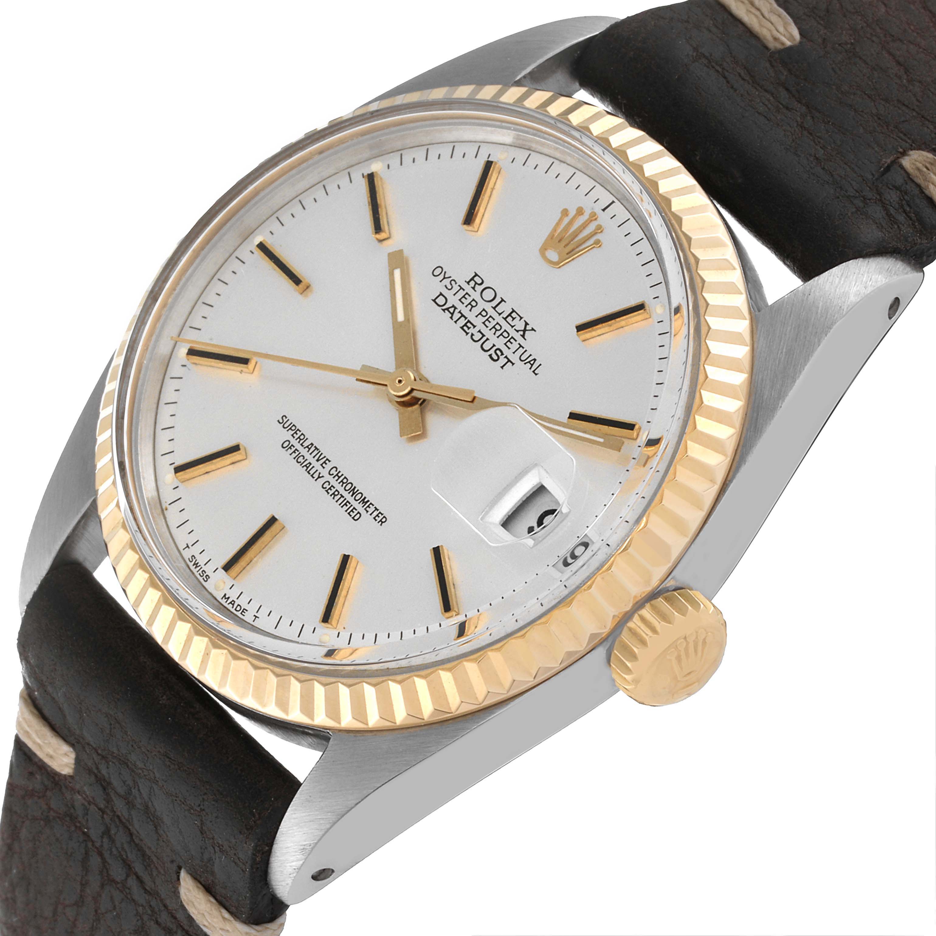 This is a side angle view of the Rolex Vintage Collection 1601 Men's Steel and Gold (two tone) Silver Dial 1601 Men's Steel and Gold (two tone) Silver Dial Datejust, showing the face, bezel, crown, and a portion of the leather strap.
