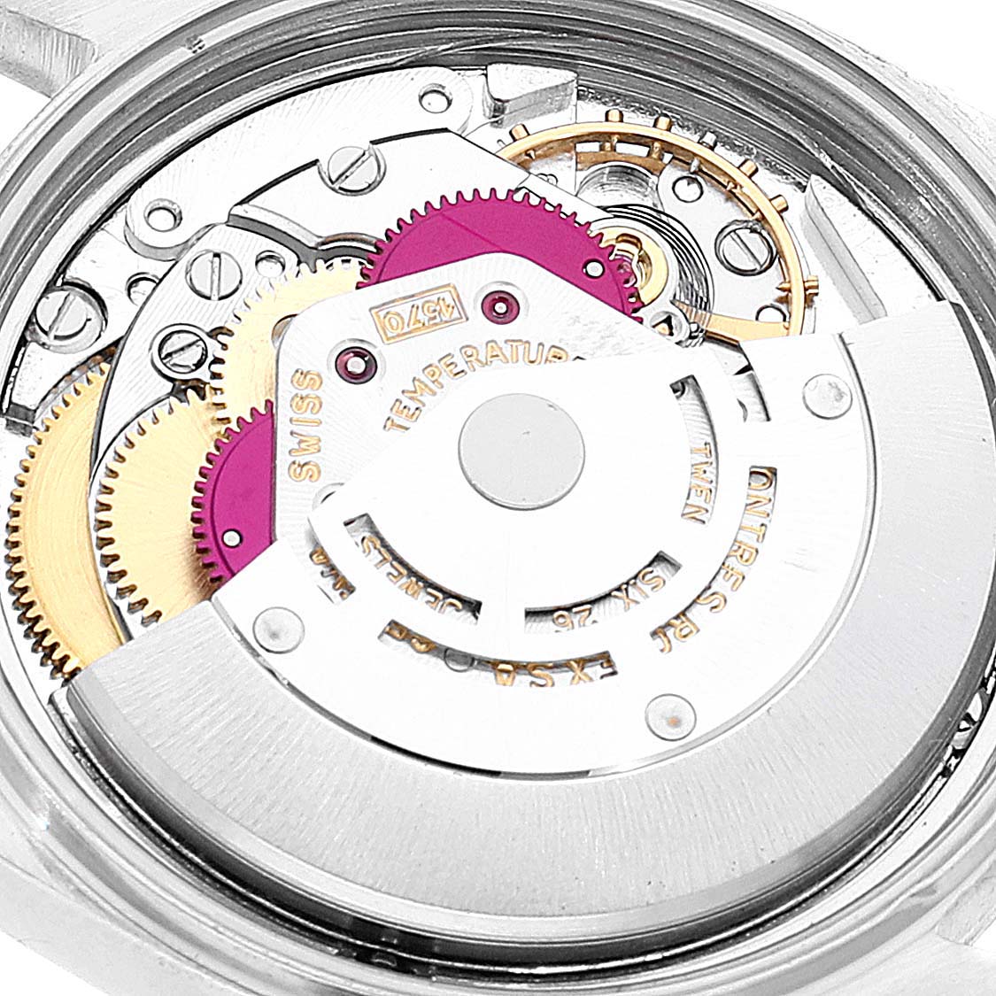 The image shows an angled close-up of the internal mechanical movement of a Rolex Vintage Collection 1601 Men's Steel and Gold (two tone) Silver Dial 1601 Men's Steel and Gold (two tone) Silver Dial watch.